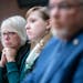 Minnesota Representative Liz Reyer listens alongside fellow committee members to testimonies on the End-of-Life Options Act during a hearing in the Mi