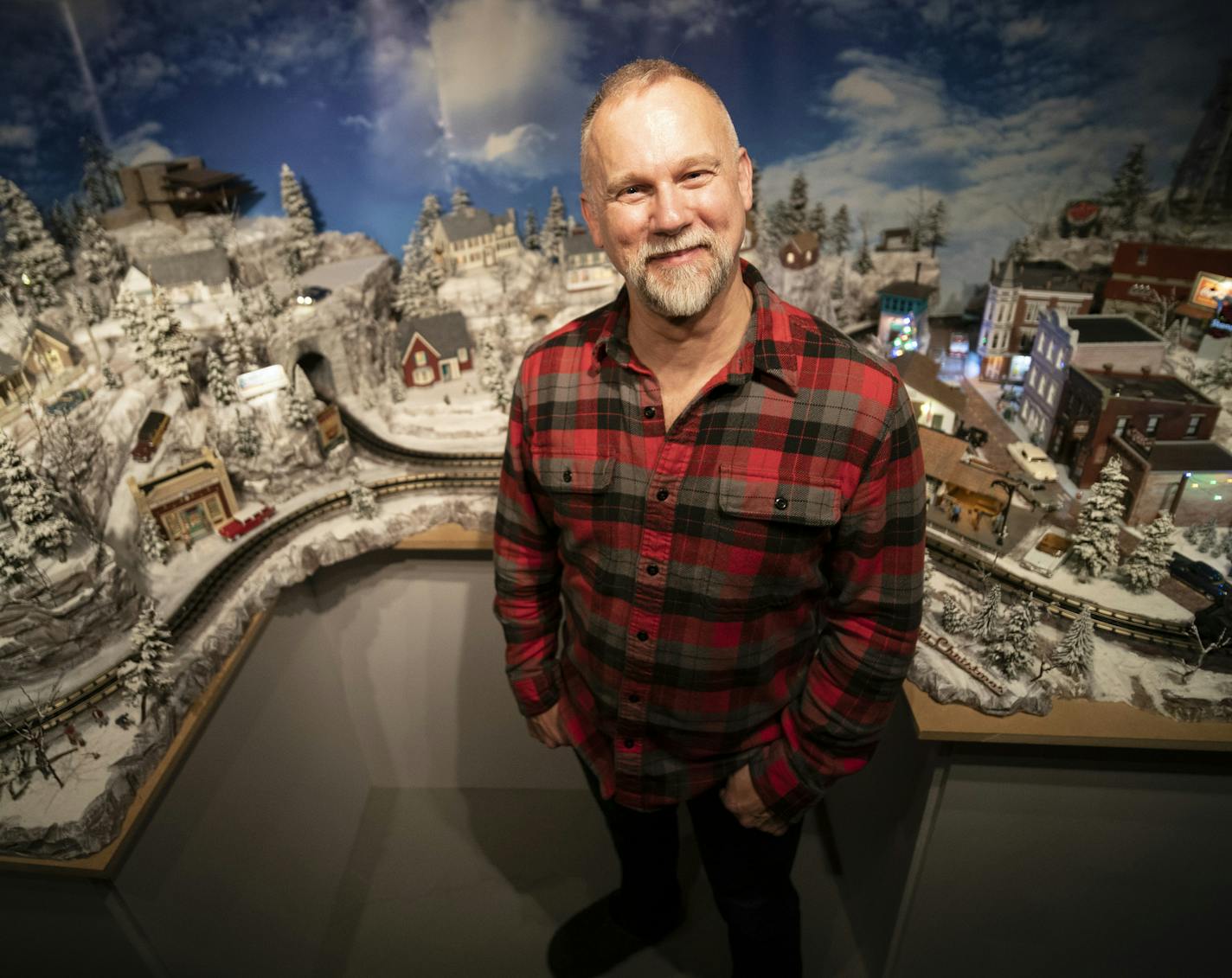 Jeff Junkins has created a village of handcrafted miniature buildings that he displays on the lower level of his Golden Valley home.