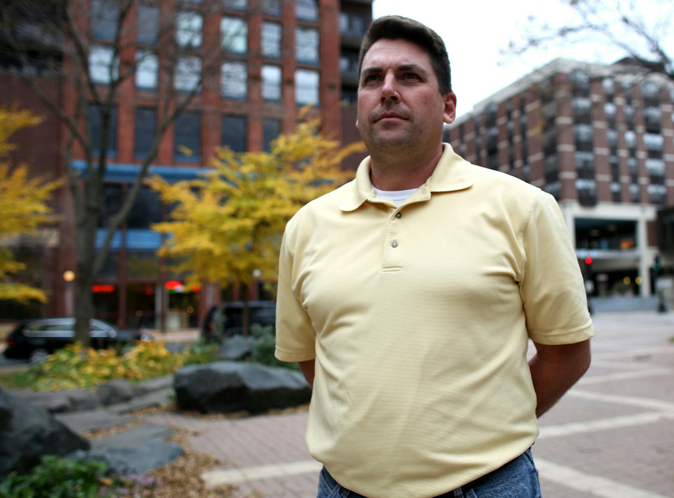 Brian Balfanz, an Army veteran who works for the city of St. Paul, stood in Mears Park. ] (KYNDELL HARKNESS/STAR TRIBUNE) kyndell.harkness@startribune.com Army veteran at Mears Park in St. Paul Min., Friday, October 17, 2014. Brian Balfanz challenged St. Paul city hiring practices and won his case charging the city with violating state law giving veterans hiring preferences.