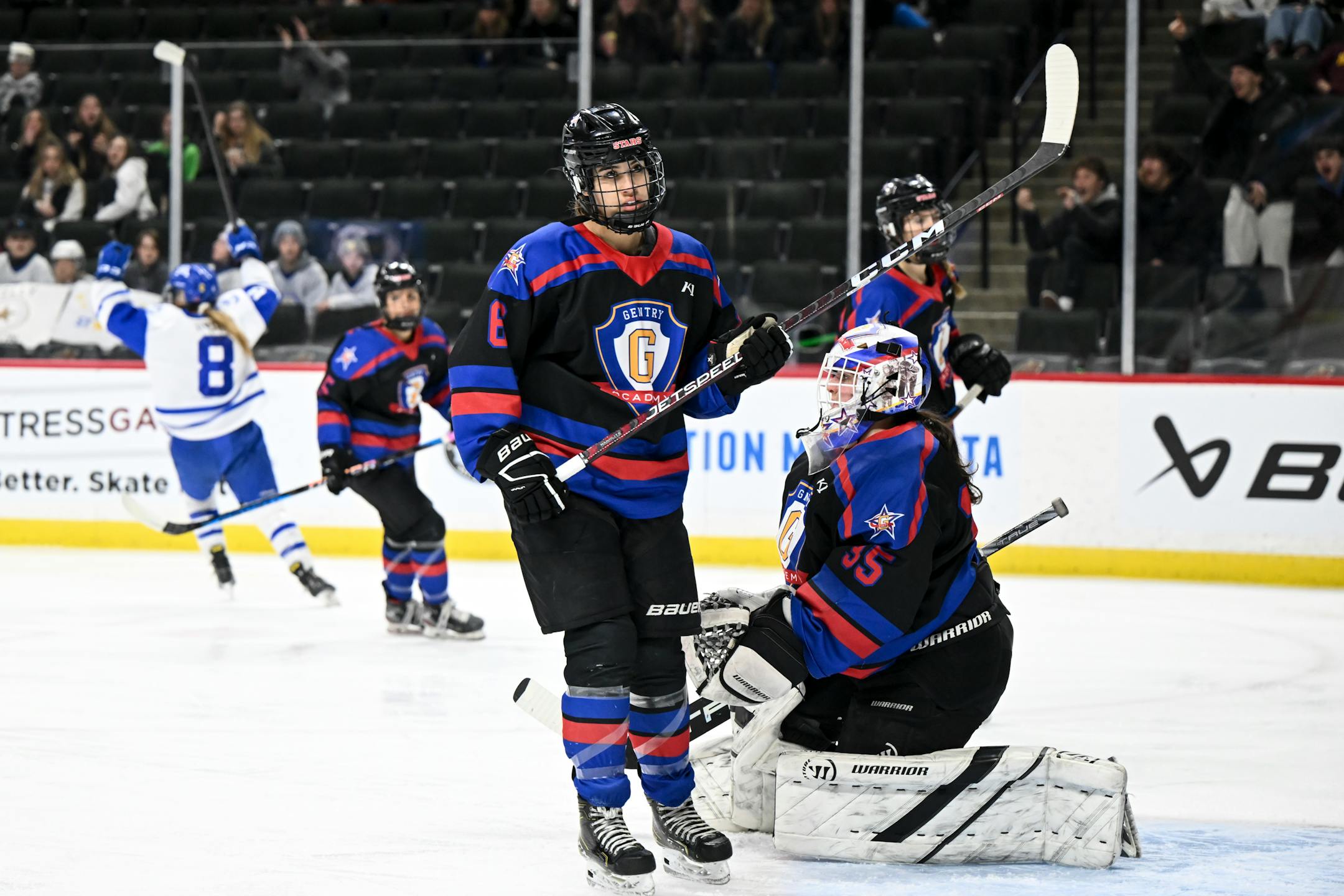 Gentry defenseman Kaitlin Roberts (6) and goaltender Zoe Laming (35) are dejected after a goal by Minnetonka forward Molly Ryan (8) during the first period.