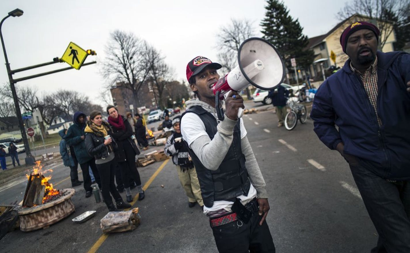 At the 4th Precinct in North Minneapolis, protesters continued to demand answers over the death of Jamar Clark who was shot and killed by police .