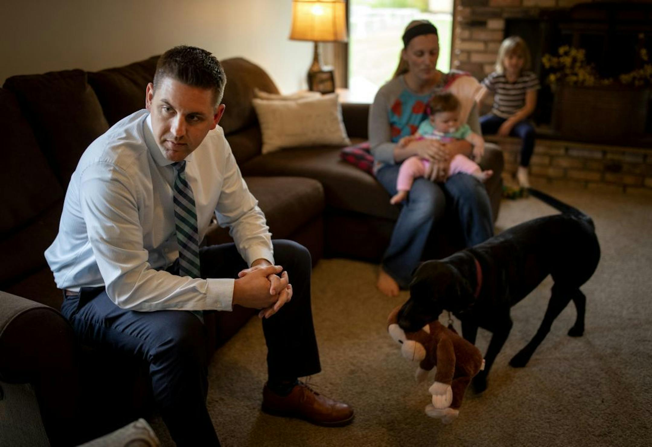 While on call funeral director Aaron Stromberg spent time with his family. His wife Caitlin is also a funeral director. Stromberg works on call for five 24-hour shifts.