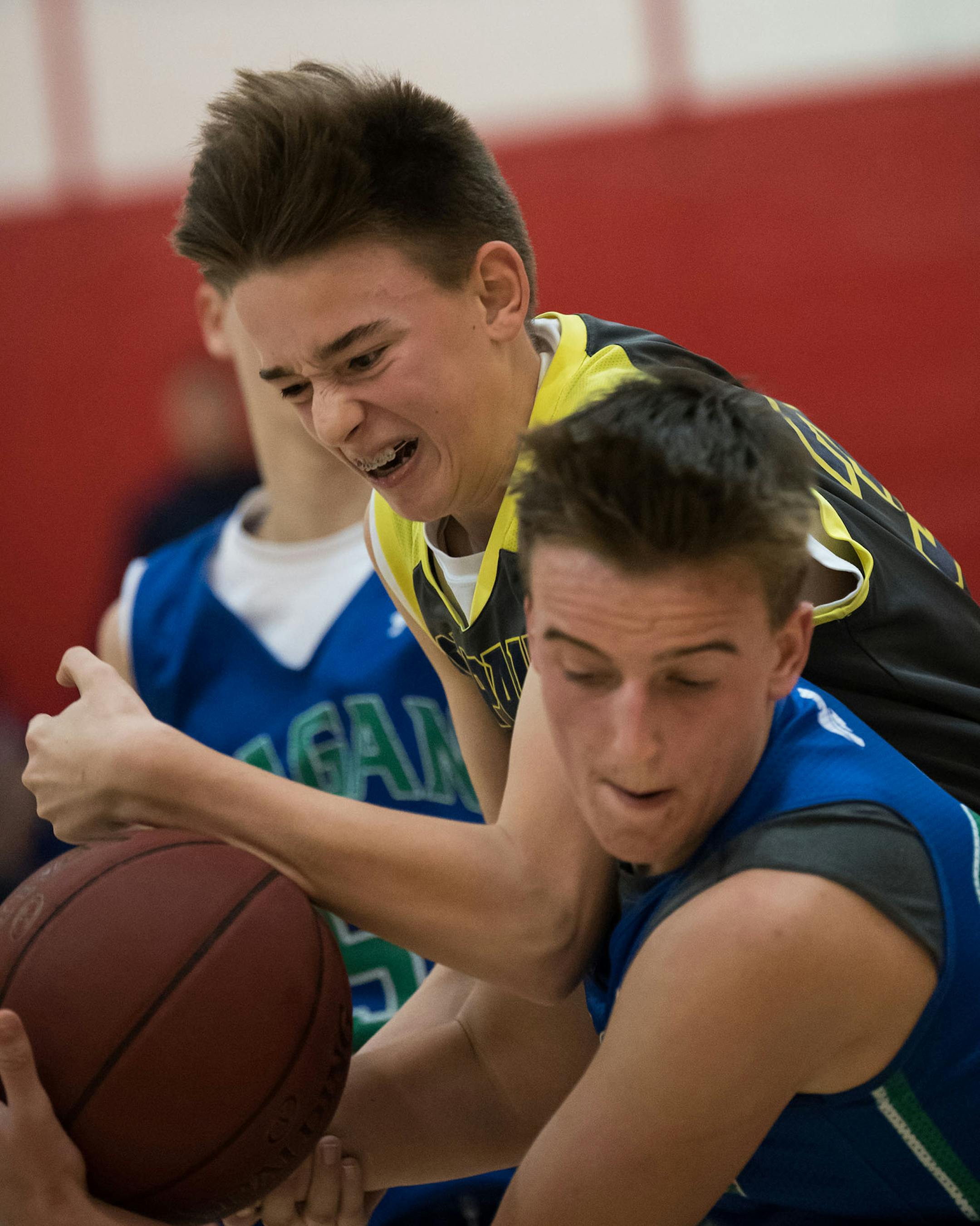 St. Paul's eighth-grade traveling team is happy to have Terence O'Laughlin, the retired grandfather of one of the players, capturing their season. Laura Pfeiffer sent in this photo of her son Aidan Phelps (in gray) taken by O'Laughlin that she is grateful to have. [focus030517