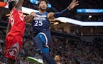 Wolves guard Derrick Rose passed in the second quarter against the Rockets' Clint Capela in Game 3 Saturday at Target Center.
