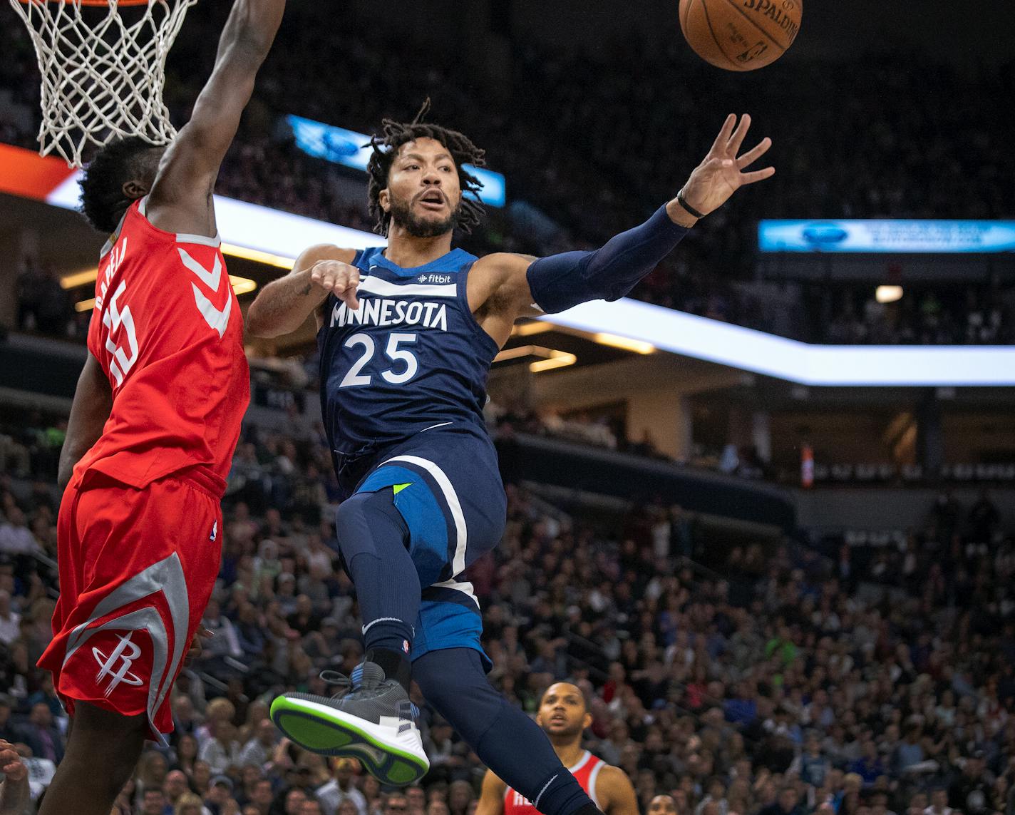 Wolves guard Derrick Rose passed in the second quarter against the Rockets' Clint Capela in Game 3 Saturday at Target Center.