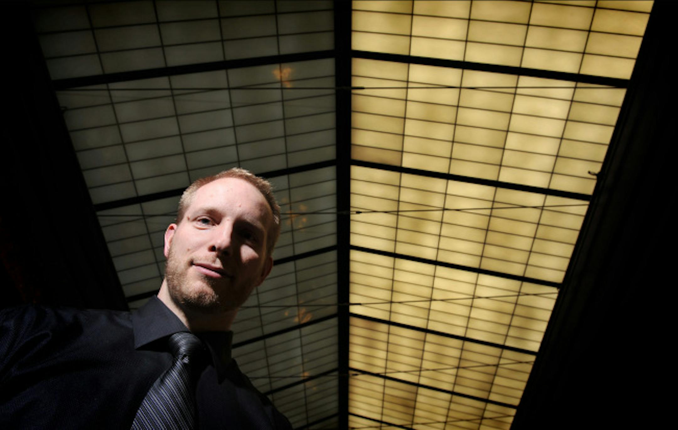 Creatis president Chuck Swensson in his company's Minneapolis warehouse district headquarters. Creatis is a marketing, communications and creative services firm that works for companies looking to outsource creative projects.