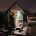 Four formerly homeless people, including a couple, have settled into a cluster of tiny houses they helped build in Madison along with members of Occup