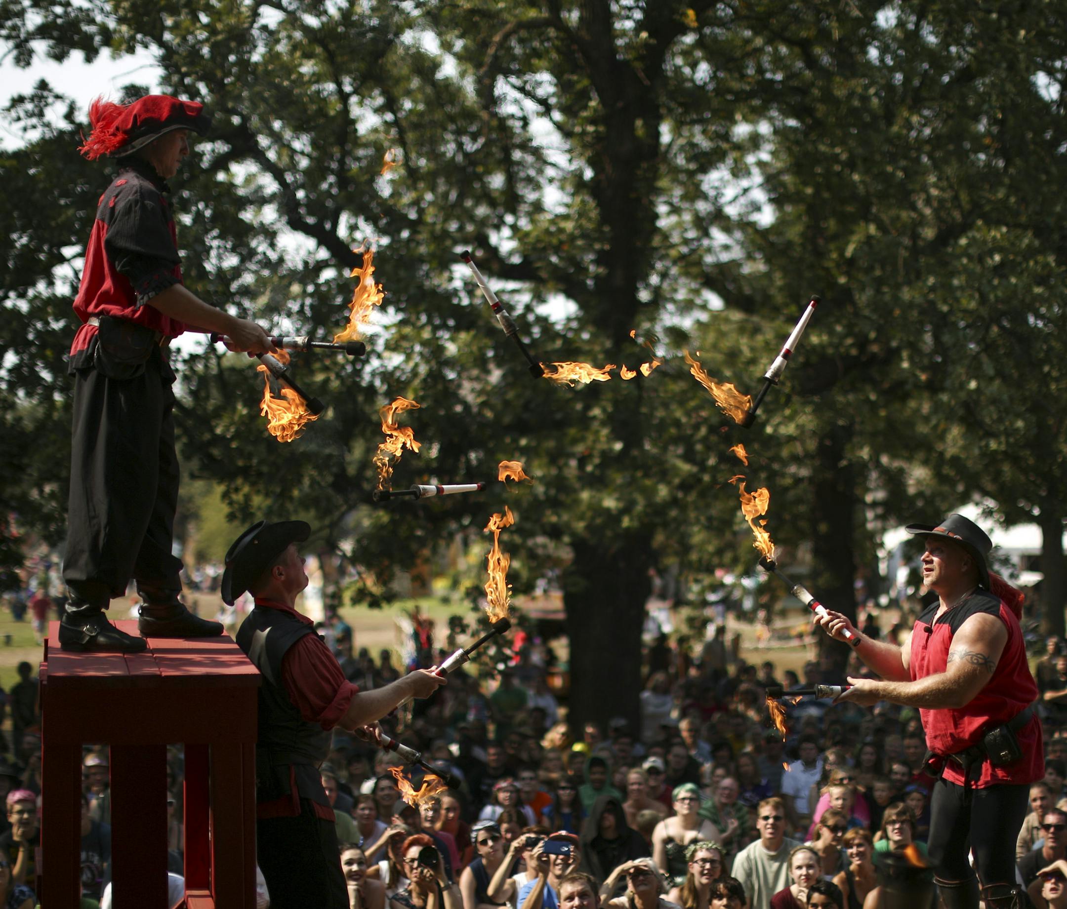 The Danger Committee performed their show comprised of feats of skill and "escalating stupidity" at the Minnesota Renaissance Festival Sunday afternoon. They are, from left, Jason LeMay, Caleb McEwen, and Mick Lunzer. ] JEFF WHEELER &#xef; jeff.wheeler@startribune.com The 45th season of the Minnesota Renaissance Festival is underway in Shakopee, with the theme this weekend being "Silk Road: Discover the Riches." The fair was photographed Sunday afternoon, August 30, 2015 in Shakopee. The fair ru