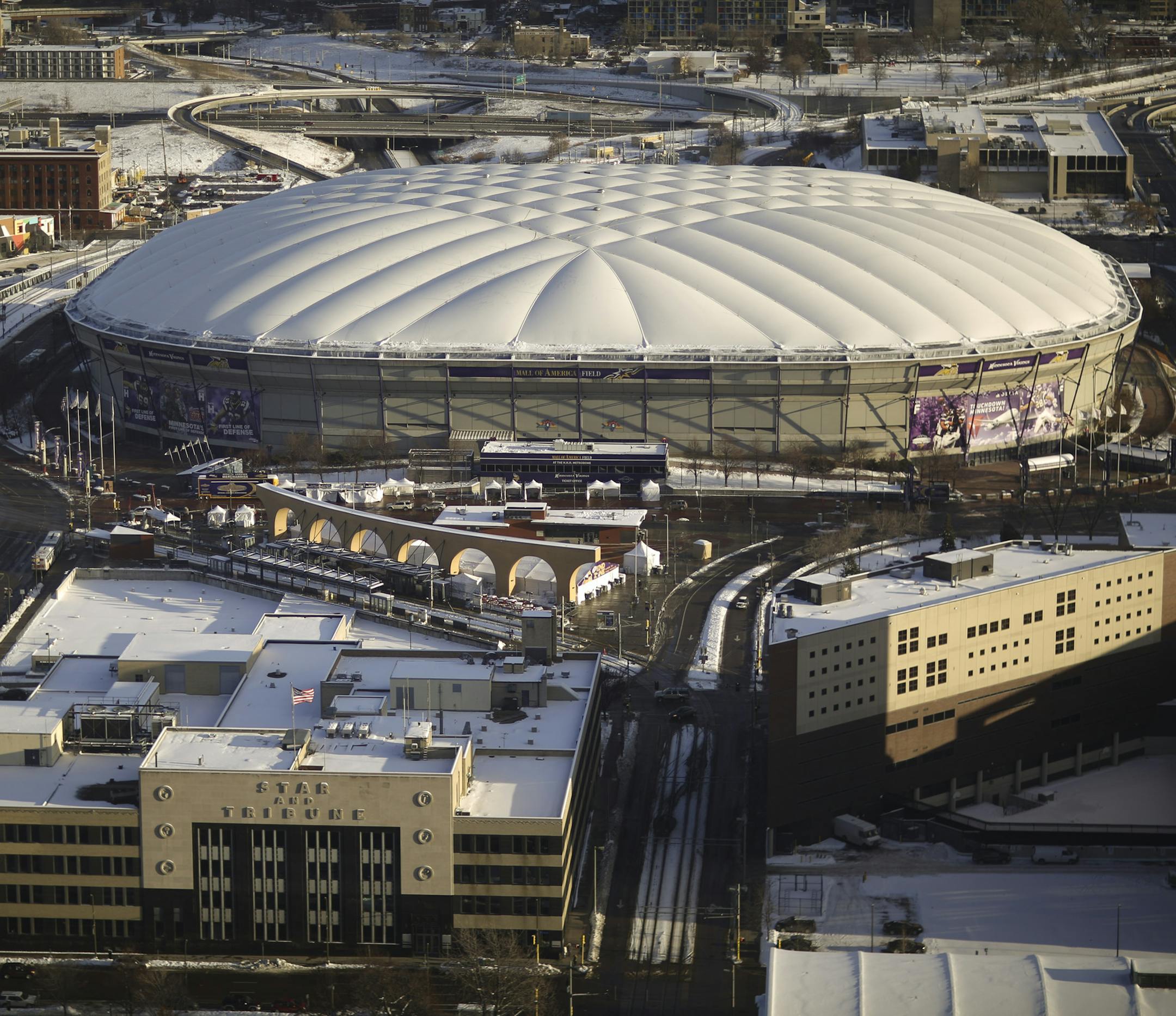 The Metrodome, with the Star Tribune building in the foreground, in a view from the U.S. Bank building Tuesday afternoon, December 17, 2013 in Minneapolis.