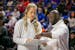 Florida head coach Kelly Rae Finley, left, and assistant Julian Assibey, right, talk over strategy before a game against South Carolina.
