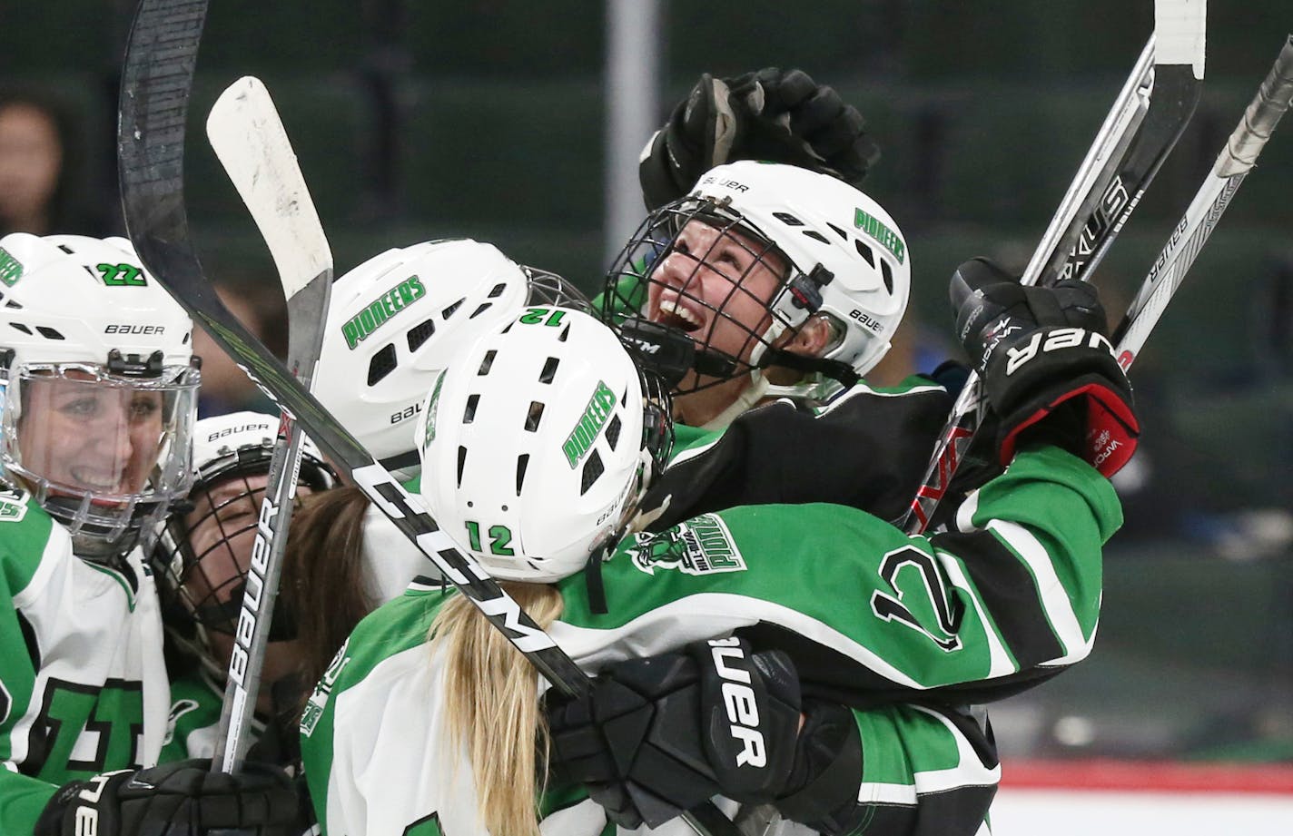 Hill-Murray's Taylor Wemple celebrated with teammates after scoring the first goal of the game during the first period. ] (KYNDELL HARKNESS/STAR TRIBUNE) kyndell.harkness@startribune.com Girls' hockey state tournament. Eastview vs. Hill-Murray Thursday, Feb. 23, 2016 at the Xcel Energy Center in St. Paul, Min. ORG XMIT: MIN1702231531495573