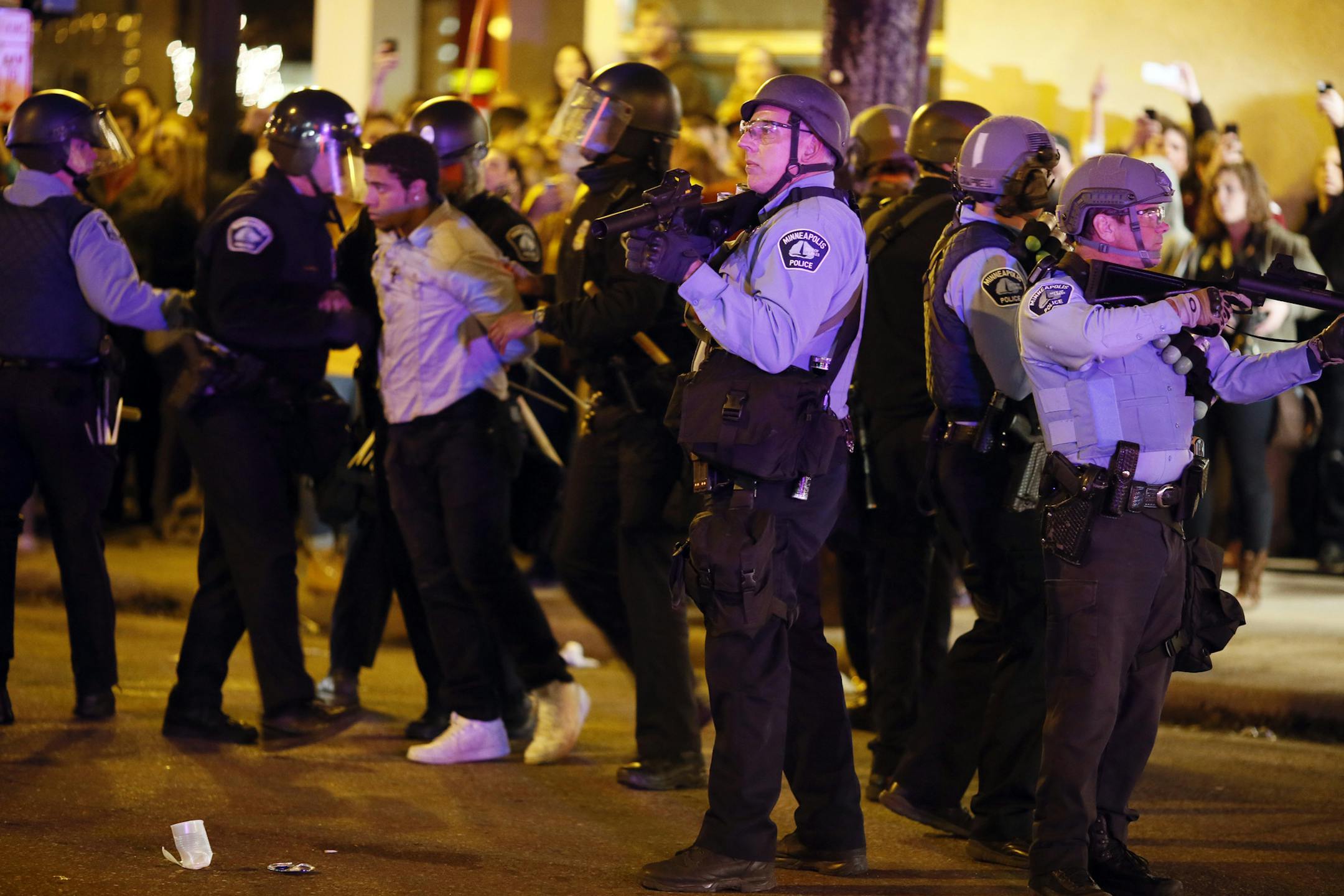 Police making arrest at the University of Minnesota Saturday April 12, 2014 in Minneapolis , MN. ]JERRY HOLT jerry.holt@startribune.com