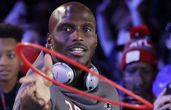 New England Patriots' Jason McCourty plays a game during Opening Night for the NFL Super Bowl 53 football game Monday, Jan. 28, 2019, in Atlanta. (AP 