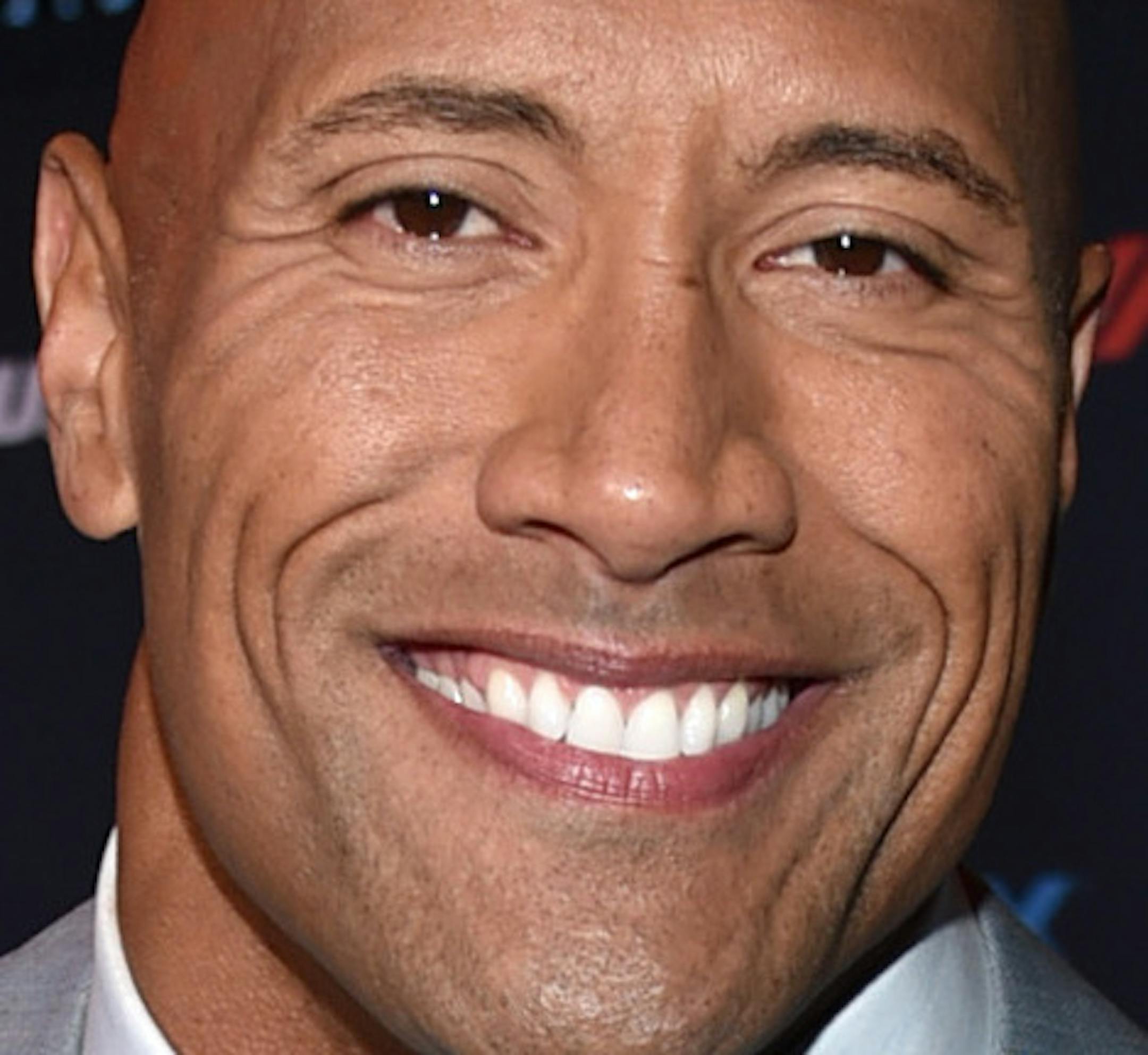 Dwayne Johnson arrives at the premiere of "Furious 7" at the TCL Chinese Theatre IMAX on Wednesday, April 1, 2015, in Los Angeles. (Photo by John Shearer/Invision/AP)