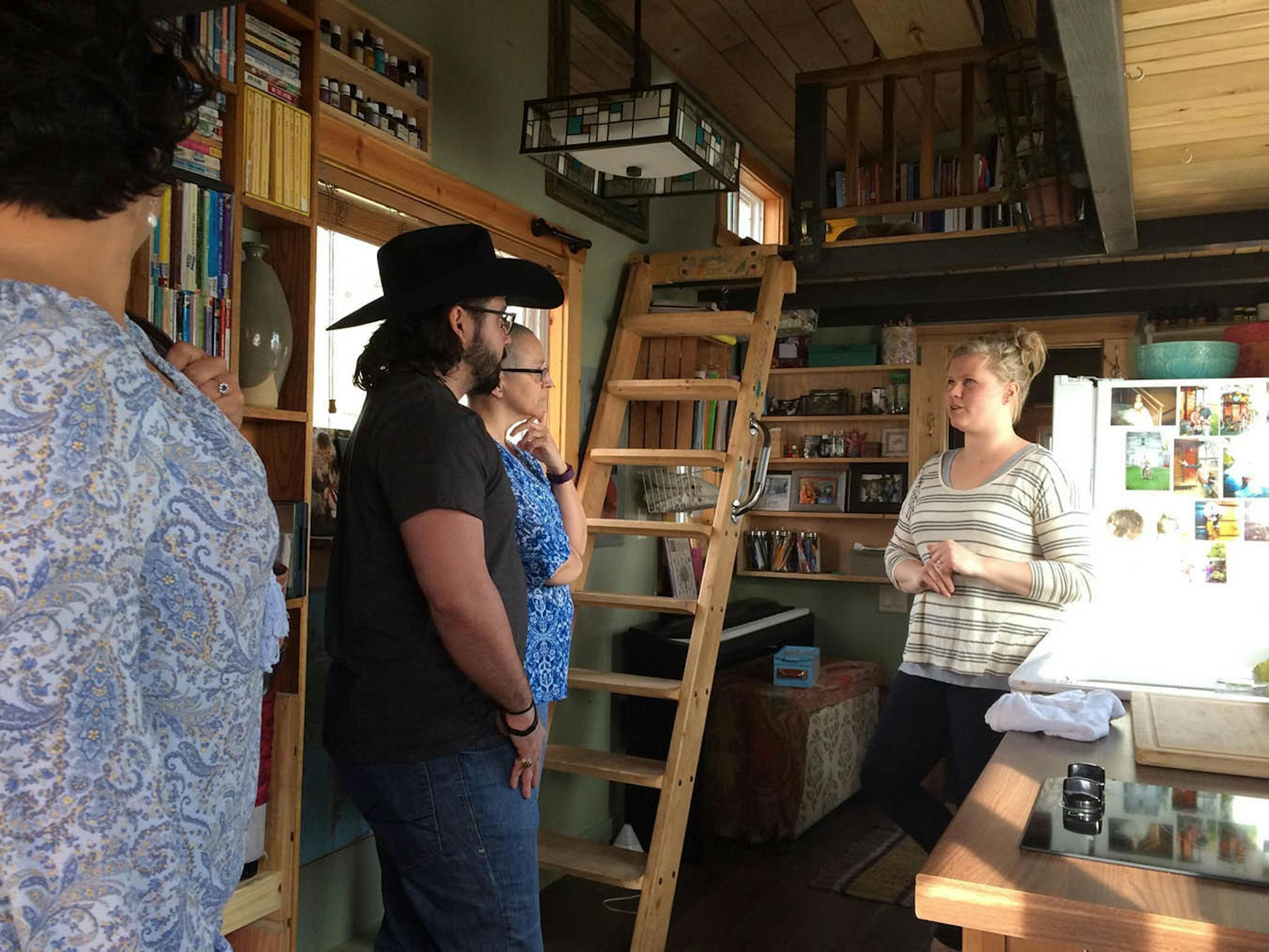 Kim Kasl, right, answered visitors' questions about her tiny house