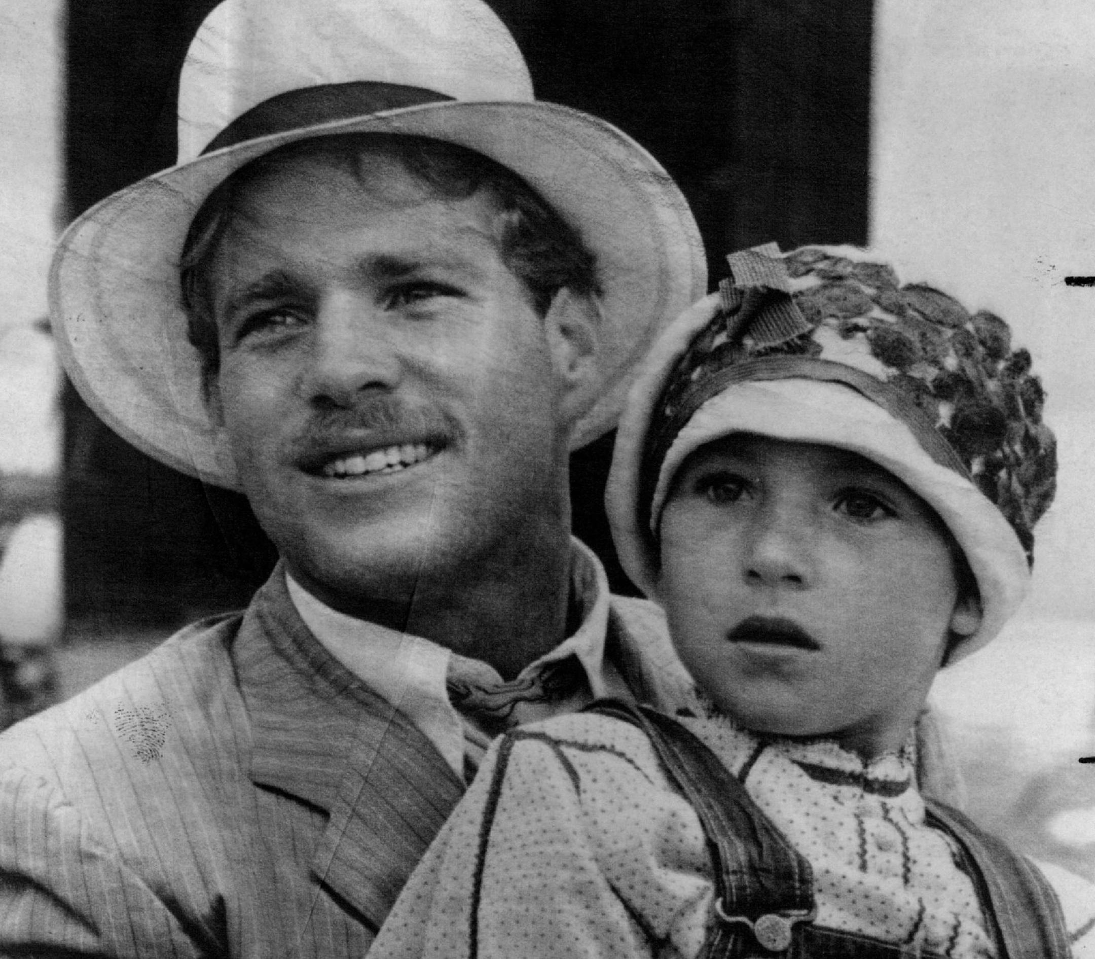 May 21, 1973 One of the most impressive acting discoveries in a quarter century is 9-year-old Tatum O'Neal. She is the daughter of Ryan O'Neal and they are shown above. In a scene from "Paper Moon" in which they co-star. Tatum,combining the qualities of Margaret O'Brien with a touch of Jackie Coogan in their moppet days, makes "Paper Moon" one of ***** August 7, 1977