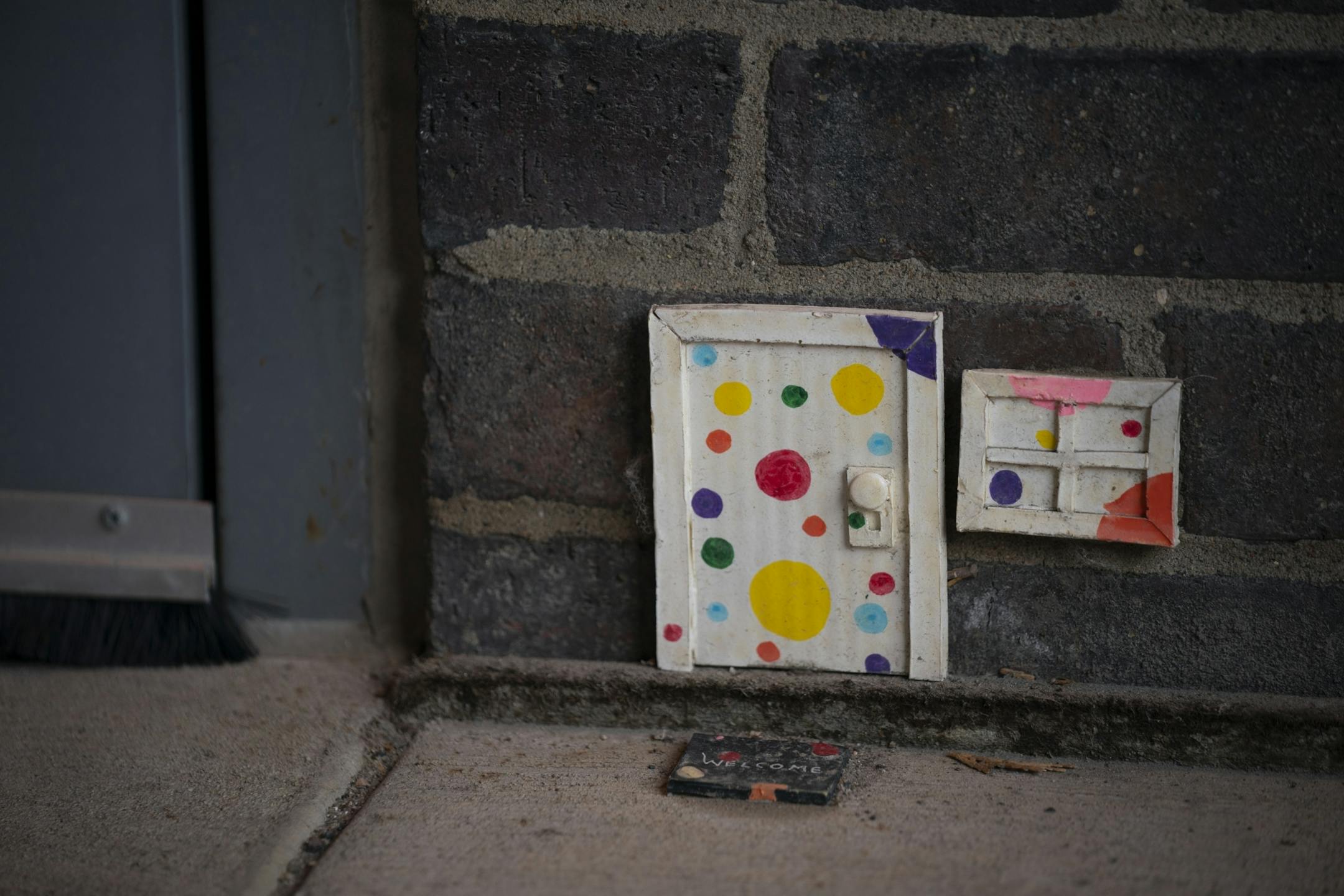 A mouse door installed by Mous510 at the entrance to Rise Bagel Co. in the North Loop.
