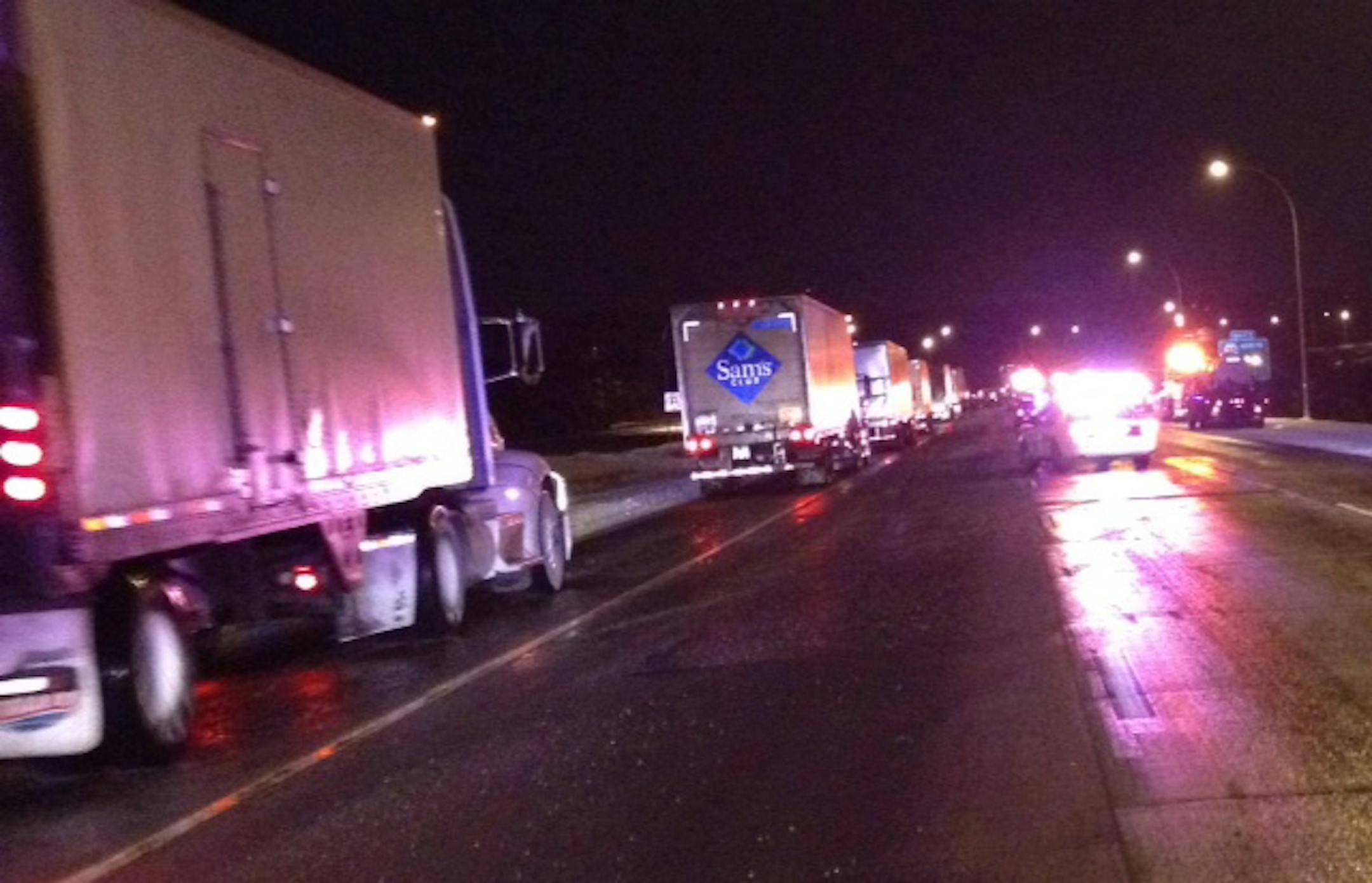 The Minnesota State Patrol steers traffic to one lane after multi-vehicle crash on eastbound I-94 in Woodbury on Dec. 16, 2013.