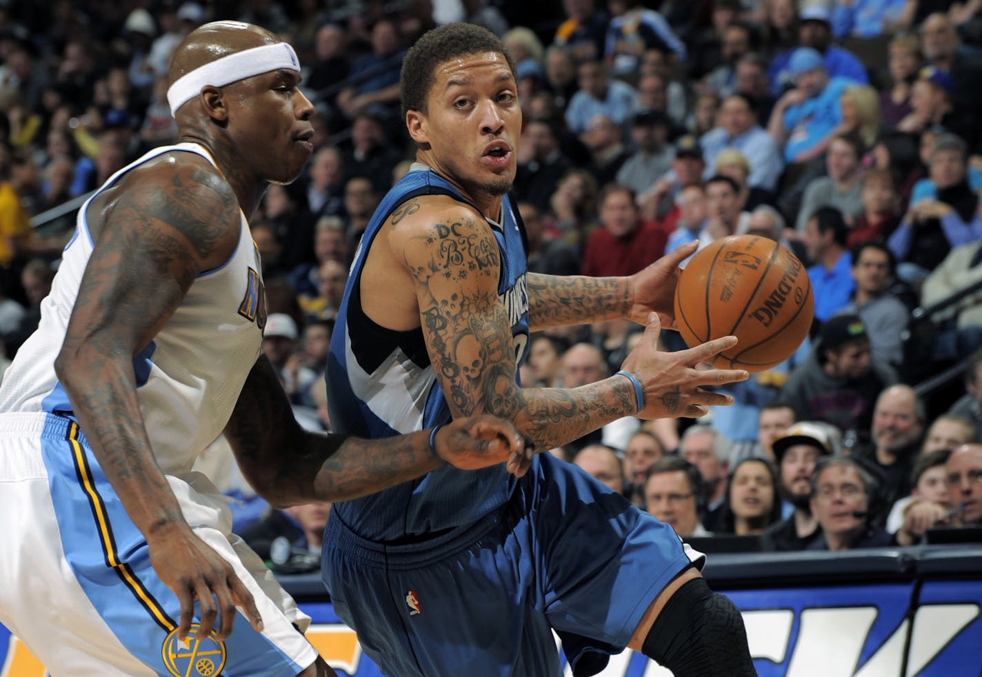 Wolves forward Michael Beasley (right)