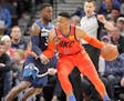 Oklahoma City Thunder guard Russell Westbrook drives against Timberwolves guard Jared Terrell