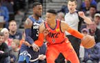 Oklahoma City Thunder guard Russell Westbrook drives against Timberwolves guard Jared Terrell