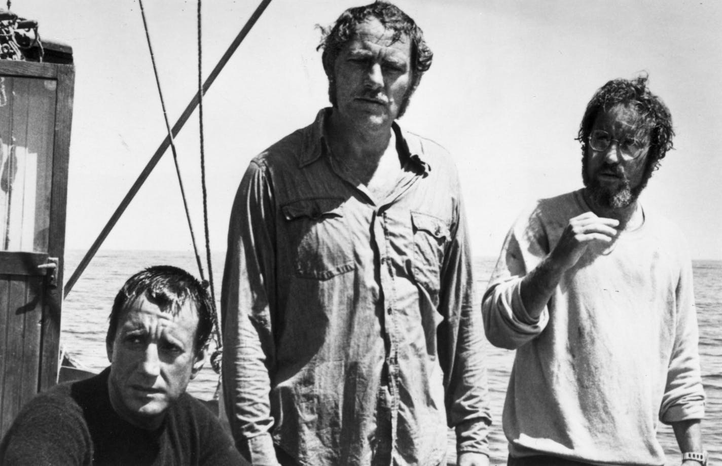 (left to right) Roy Scheider, Robert Shaw, and Richard Dreyfuss star in the 1975 suspense movie JAWS, based on the book by Peter Benchley. File photo courtesy of Universal Pictures.