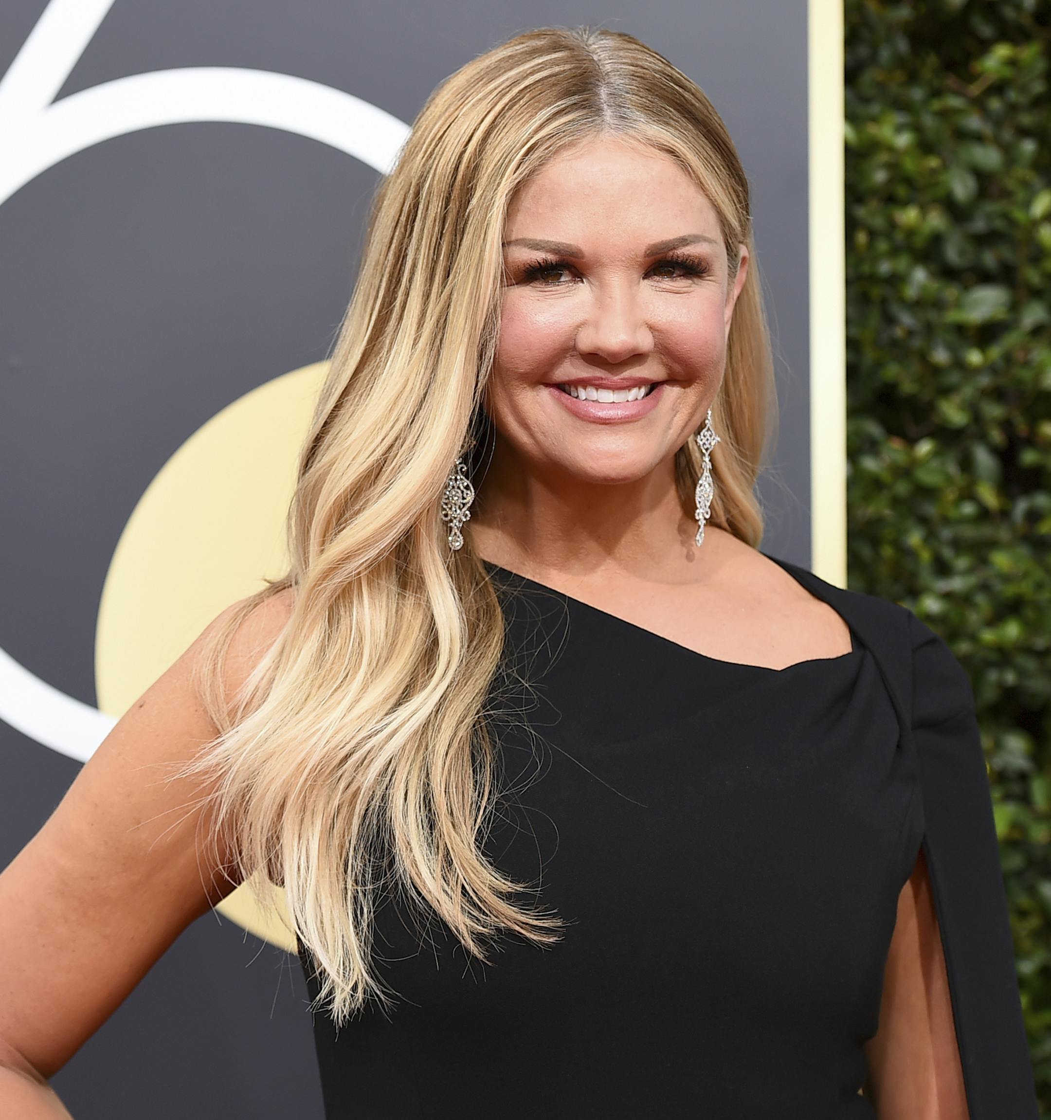 Nancy O'Dell arrives at the 75th annual Golden Globe Awards at the Beverly Hilton Hotel on Sunday, Jan. 7, 2018, in Beverly Hills, Calif. (Photo by Jordan Strauss/Invision/AP)