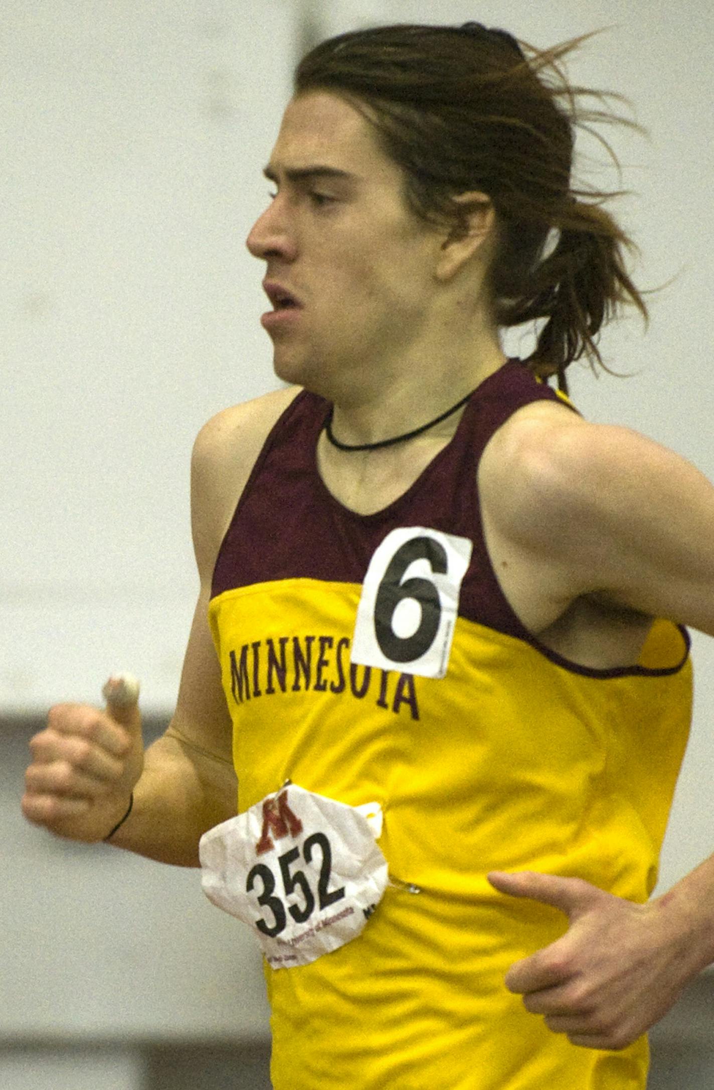 DAVID BREWSTER &#xef; dbrewster@startribune.com Sunday 02/28/10 Minneapolis Second and final day of the Big Ten indoor track and field meet ... IN THIS PHOTO: ] In the Men's 1 Mile Run, U of M. sophomore Ben Blankenship won 1st place Sunday afternoon at the Big Ten Indoor Championships held in the U. of M. Field House.