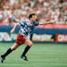 United States forward Eric Wynalda, right, reacts after he scored against Switzerland in a World Cup Group A first-round match at the Pontiac Silverdo