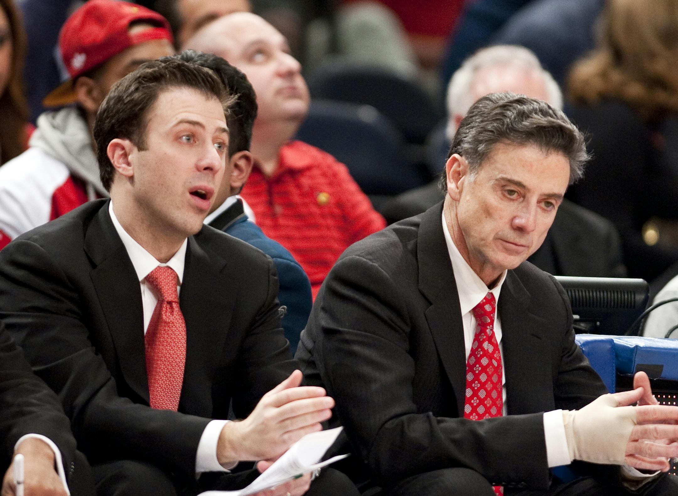 March 10 2012: Louisville's head coach Rick Pitino with son, associate coach Richard Pitino, during the Big East Championship game between the Louisville Cardinals and the Cincinnati Bearcats at Madison Square Garden in New York City. Louisville defeated Cincinnati 50-44. (Cal Sport Media via AP Images) ORG XMIT: CSMAP
