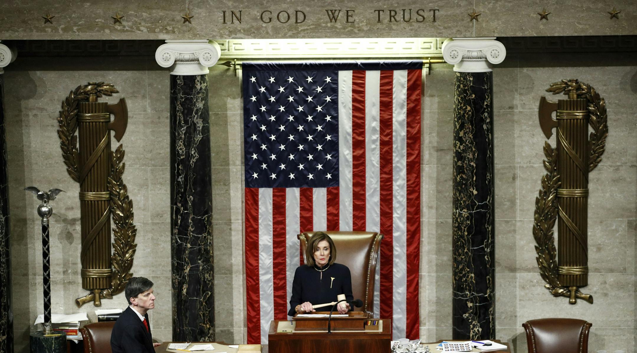 House Speaker Nancy Pelosi, D-Calif., holds the gavel as House members vote on article II of impeachment against President Donald Trump, Wednesday, Dec. 18, 2019, on Capitol Hill in Washington. (AP Photo/Patrick Semansky)