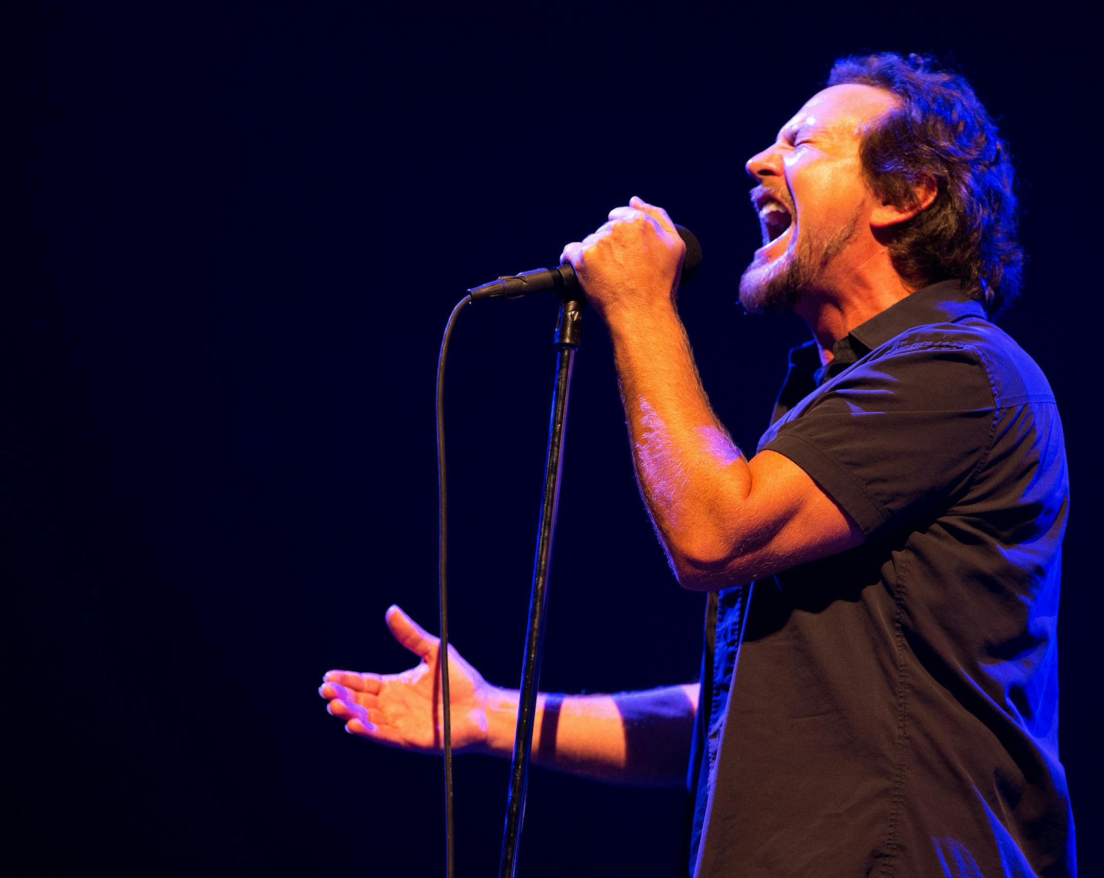Eddie Vedder, lead singer for the rock group Pearl Jam performs in Lincoln Neb., Thursday Oct. 9, 2014 at Pinnacle Bank Arena. (AP Photo/The Omaha World-Herald, Ryan Soderlin)
