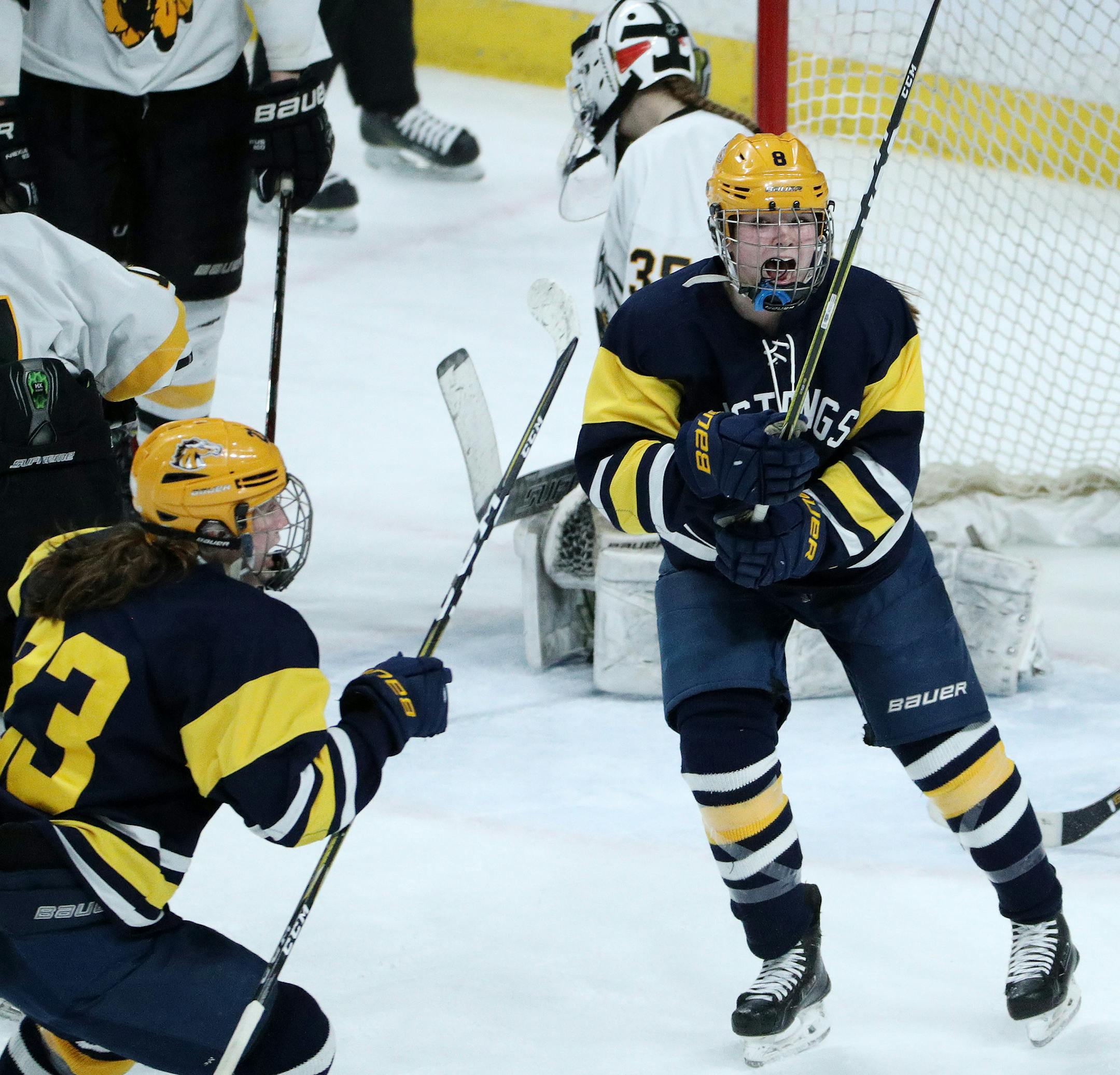 Breck School forward Sadie Lindsay (8) reacted with her teammates Breck School defenseman Katherine Solohub (23) and Breck School forward Gabby Billing (14) after scoring the game winning goal in overtime against Warroad High School Saturday. ] ANTHONY SOUFFLE ï anthony.souffle@startribune.com Game action from a MSHSL Class 1A girl's hockey championship game between the Breck School and Warroad High School Saturday, Feb. 24, 2018 at the Xcel Energy Center in St. Paul, Minn.
