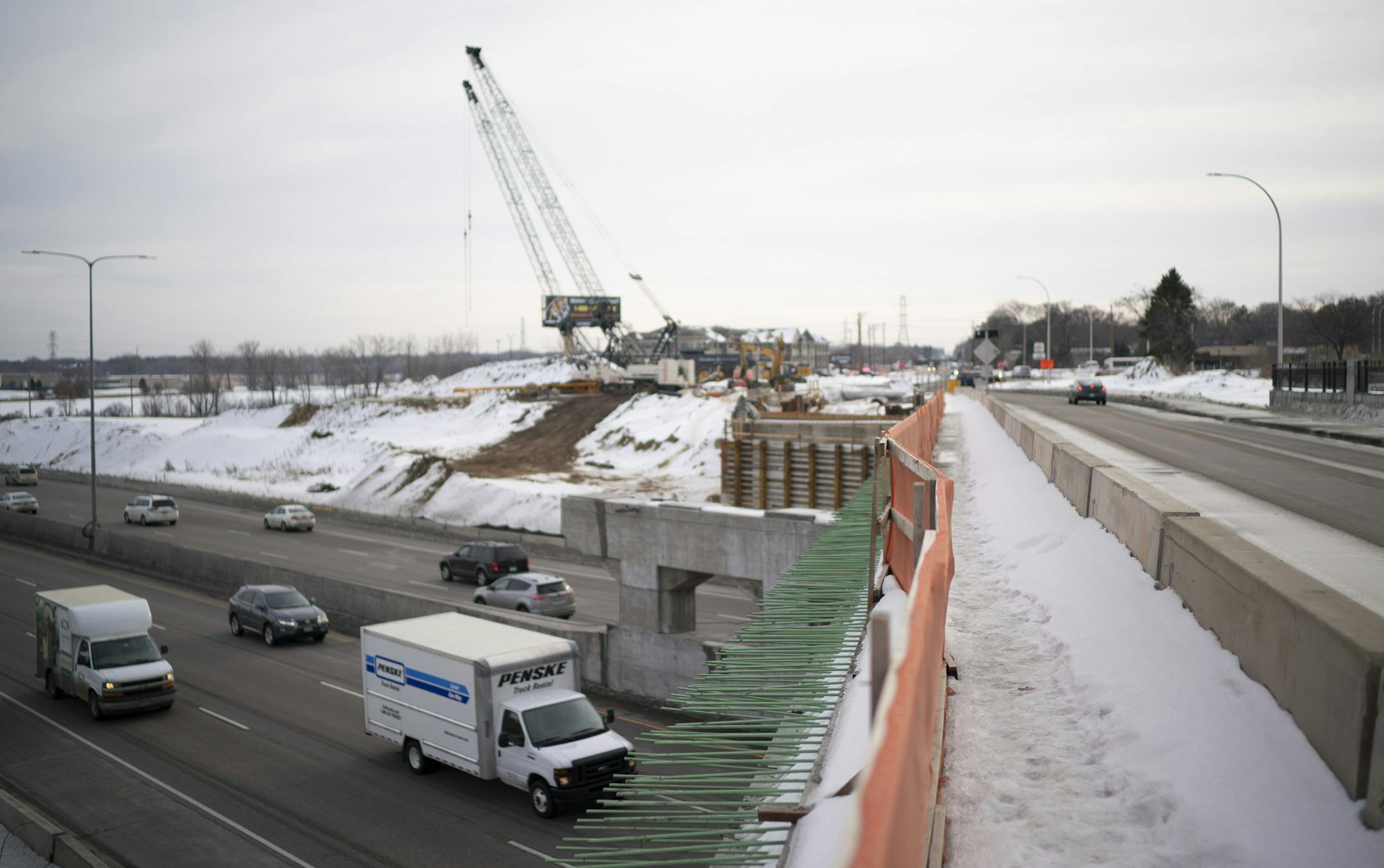 The view looking south of the construction progress on the new bridge over I-694. ] JEFF WHEELER • Jeff.Wheeler@startribune.com A $23 million reconstruction of the Rice St. bridge over I-694 that includes three roundabouts will mean smoother travels for the 18,000 motorists who pass through there everyday. Bicyclists and walkers will now have safer passage with trails on both sides of the new bridge. The construction was photographed Monday afternoon, December 23, 2019 on the Vadnais Heig