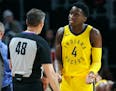 Indiana Pacers guard Victor Oladipo (4) argues a call with NBA official Scott Foster during the second half of an NBA basketball game Tuesday, Dec. 26