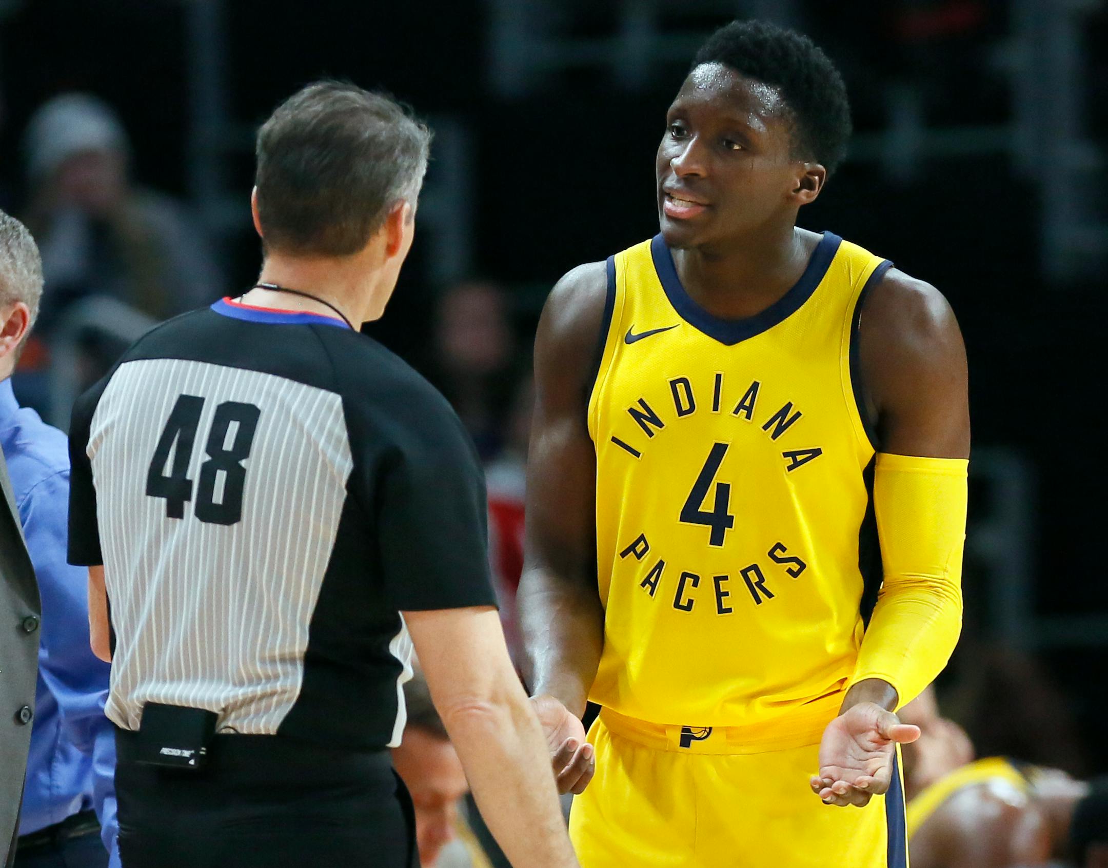 Indiana Pacers guard Victor Oladipo (4) argues a call with NBA official Scott Foster during the second half of an NBA basketball game Tuesday, Dec. 26, 2017, in Detroit. The Pistons defeated the Pacers 107-83. (AP Photo/Duane Burleson)