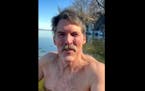 This screen shot from cell phone video provided by Eric Hovde’s campaign shows the candidate for U.S. Senate shirtless in the cold waters of Lake Me