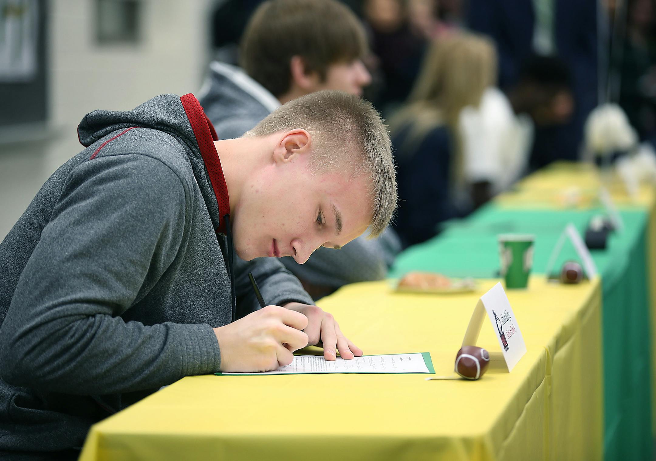Park Center football player Adam Buirge signed to Northern Illinois University during a National Signing Day Ceremony at Park Center, Wednesday, February 4, 2015 in Brooklyn Park, MN. ] (ELIZABETH FLORES/STAR TRIBUNE) ELIZABETH FLORES • eflores@startribune.com