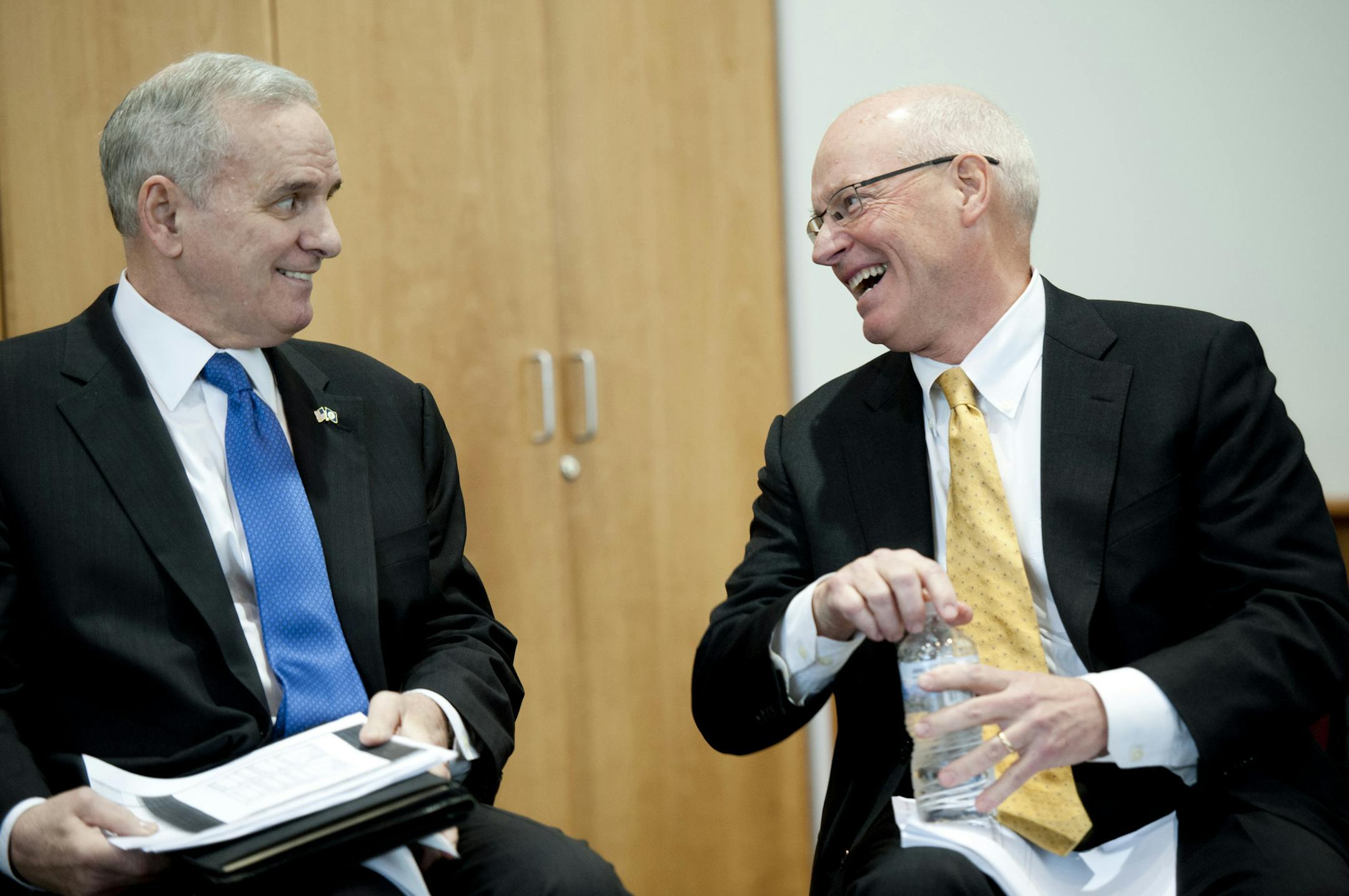 Commissioner Franz congratulated Governor Dayton on his presentation . Governor Mark Dayton unveiled his budget proposal Tuesday, January 22, 2013. This is the first time he has appeared in public since his back surgery. He will be joined by Commissioner Jim Schowalter, Commissioner Myron Frans. ] GLEN STUBBE * gstubbe@startribune.com EDS: Franz has white hair yellow tie, schowalter dark hair dark tie. ORG XMIT: MIN1301221215541529