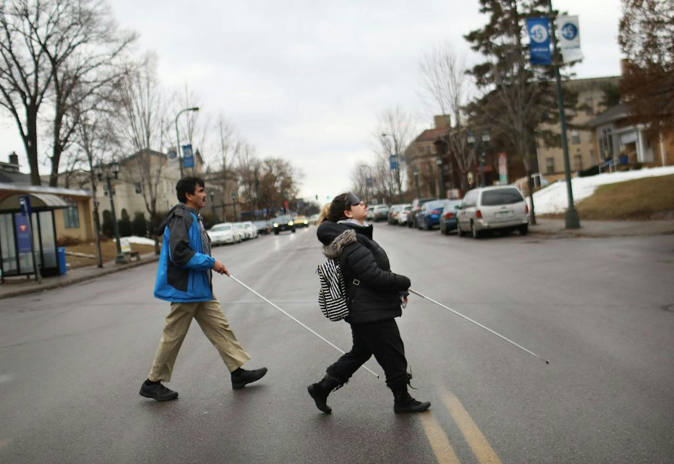 Through a class at Blind, Inc. Angie Castro, 30, is learning to navigate Minneapolis, including crossing busy streets around Blind, Inc. headquarters, near the Minneapolis Art Institute. Castro was out with Mark Erickson, cane travel instructor, familiarizing herself with the city and bus routes Thursday, March 5, 2020, in Minneapolis, MN.