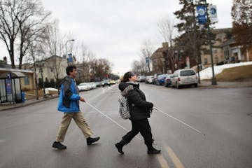 Through a class at Blind, Inc. Angie Castro, 30, is learning to navigate Minneapolis, including crossing busy streets around Blind, Inc. headquarters,