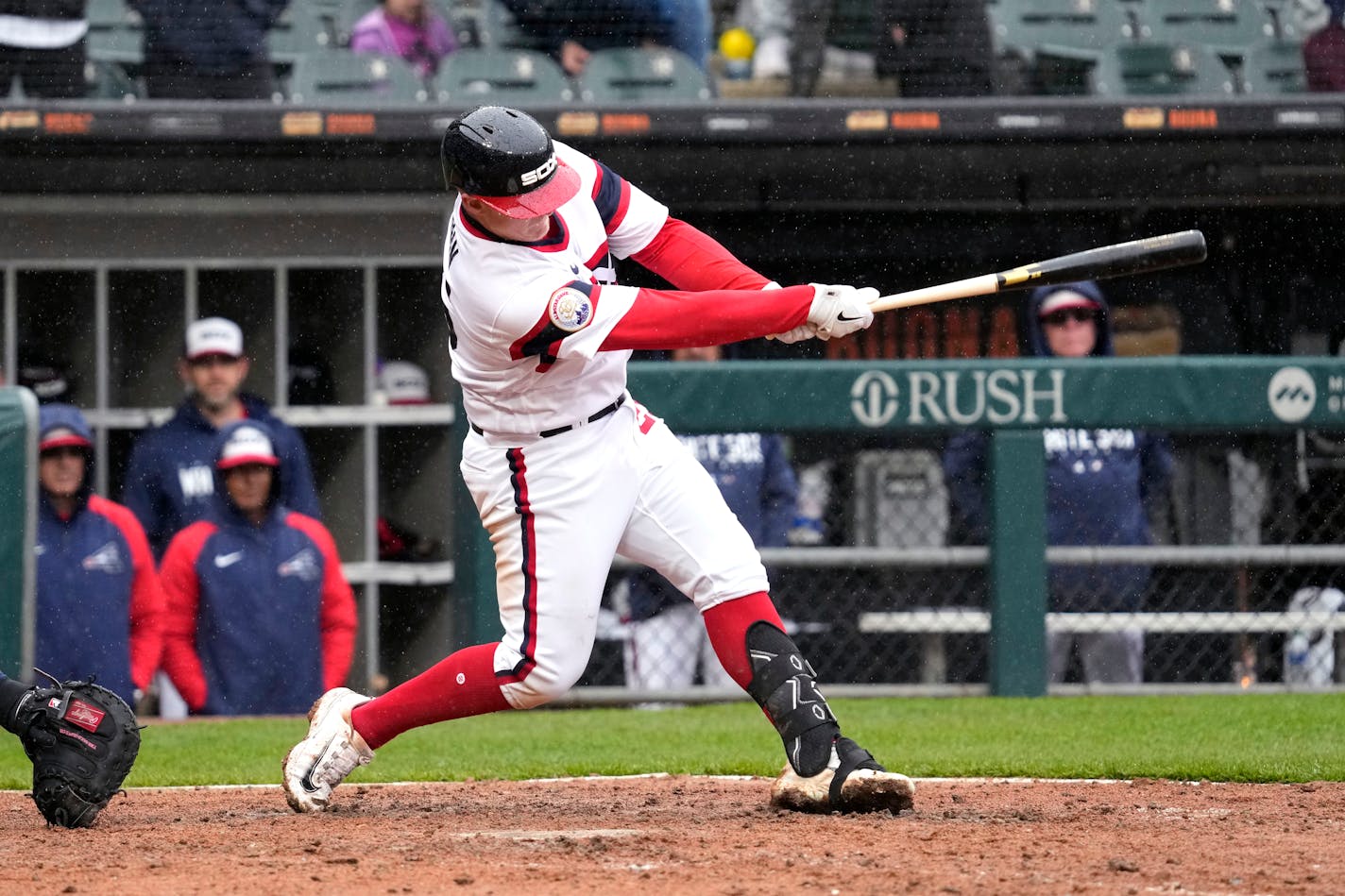 Chicago White Sox's Andrew Vaughn hits the winning three-run home run during the ninth inning of a baseball game against the Tampa Bay Rays in Chicago, Sunday, April 30, 2023. (AP Photo/Nam Y. Huh)