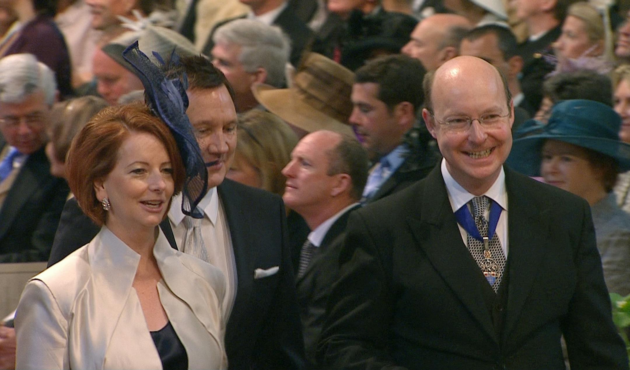 In this image taken from video, Australian Prime Minister Julia Gillard, left, arrives at Westminster Abbey for the Royal Wedding in London on Friday, April, 29, 2011. (AP Photo/APTN) EDITORIAL USE ONLY NO ARCHIVE PHOTO TO BE USED SOLELY TO ILLUSTRATE NEWS REPORTING OR COMMENTARY ON THE FACTS OR EVENTS DEPICTED IN THIS IMAGE