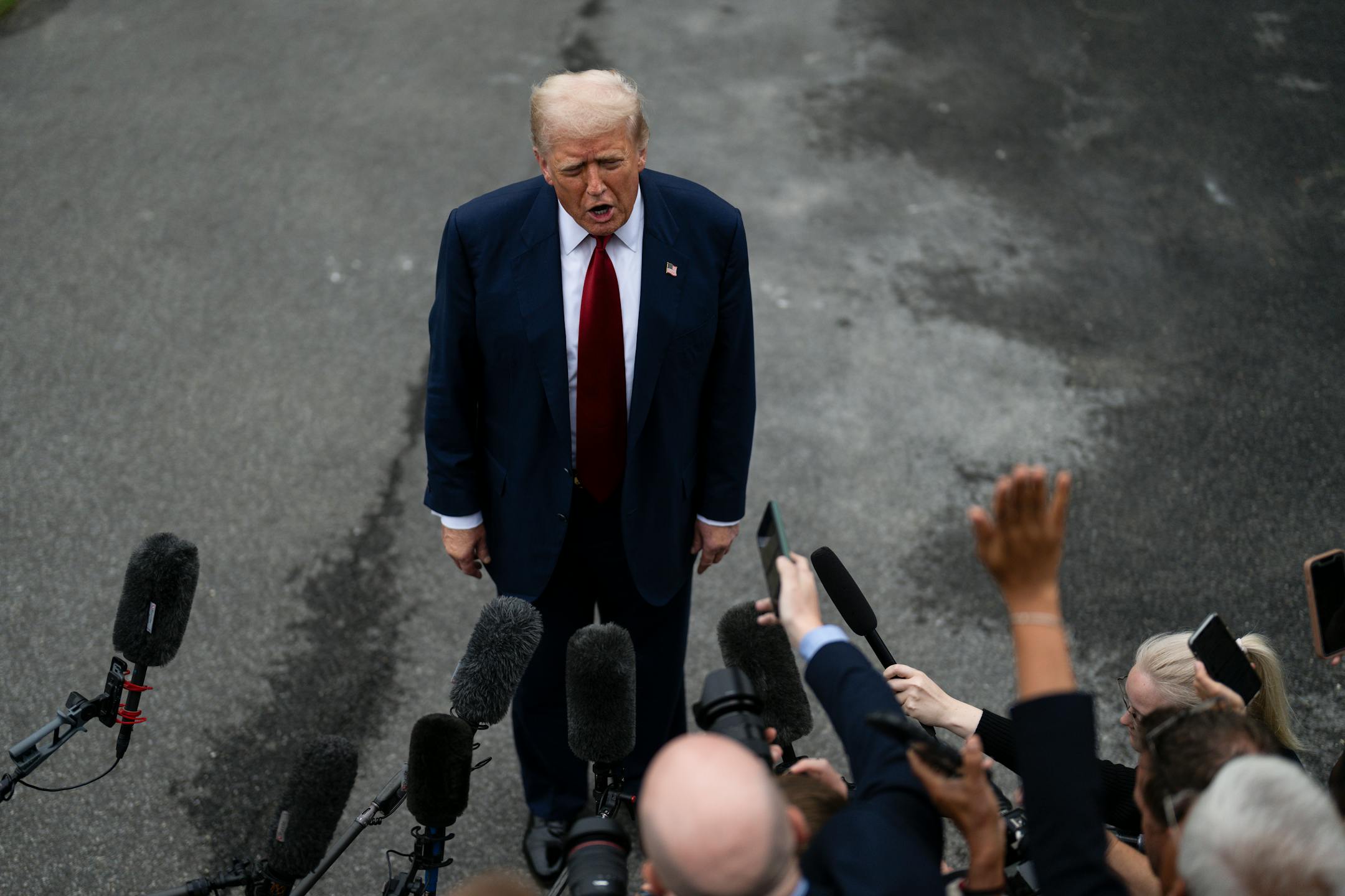 President Donald Trump speaks to reporters outside the White House before boarding Marine One in Washington, Aug. 1, 2025. President Trump fired the head of the Bureau of Labor Statistics and described a jobs report that included a big downward revision as “rigged.”