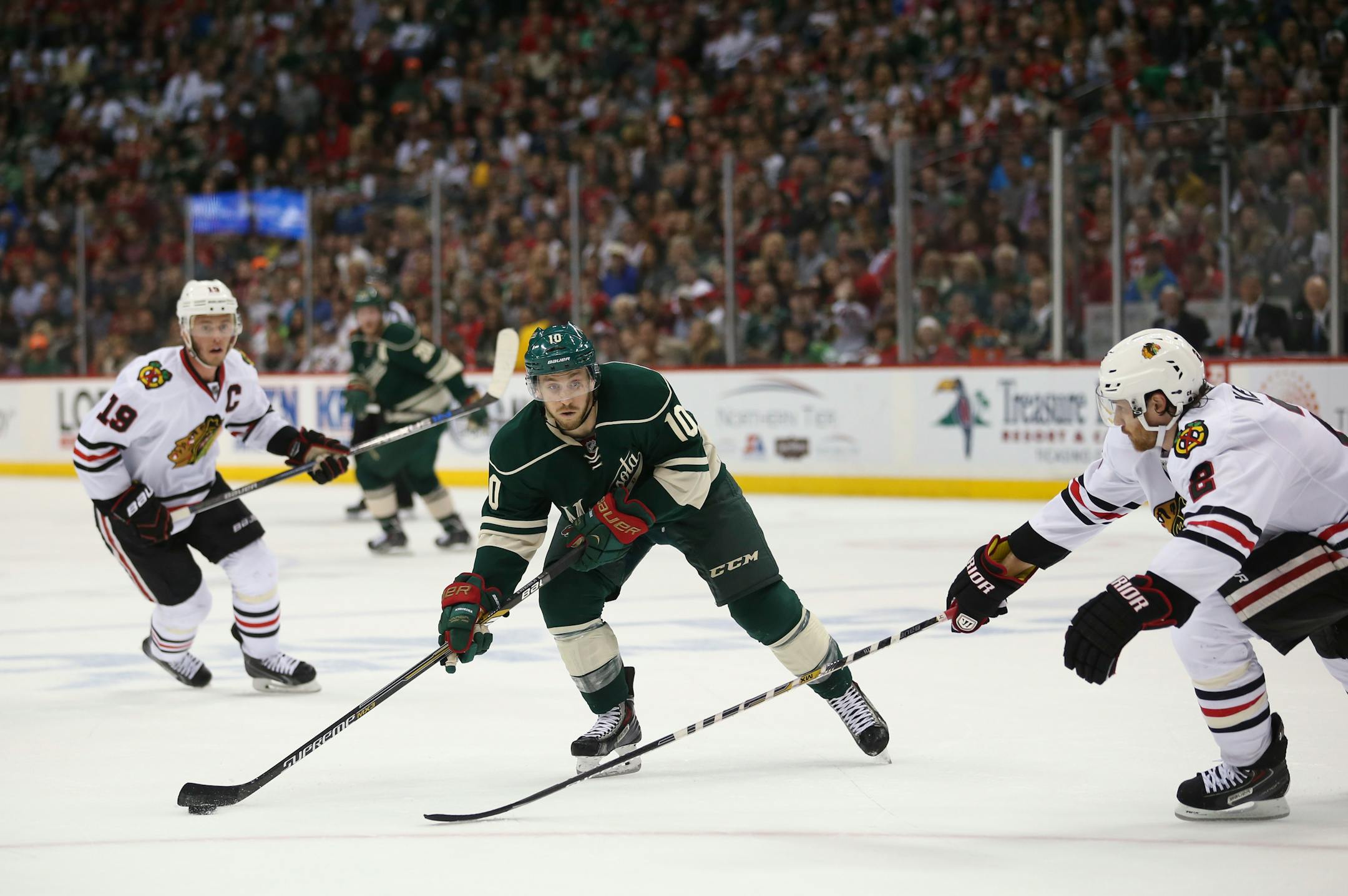 Wild center Jordan Schroeder (10) controlled the puck during last season's playoffs.