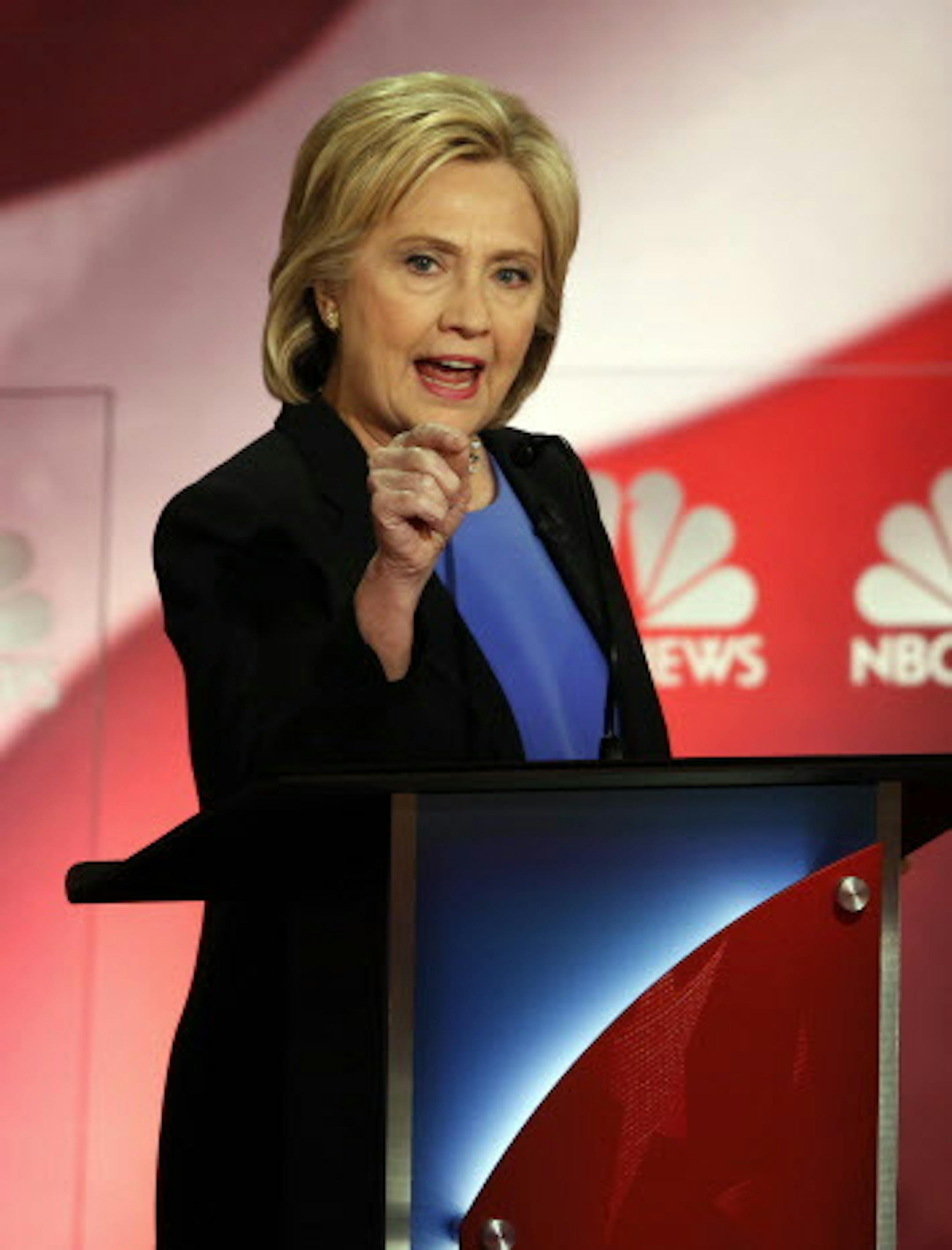 Democratic presidential candidate, Hillary Clinton speaks at the NBC, YouTube Democratic presidential debate at the Gaillard Center, Sunday, Jan. 17, 2016, in Charleston, S.C. (AP Photo/Mic Smith)
