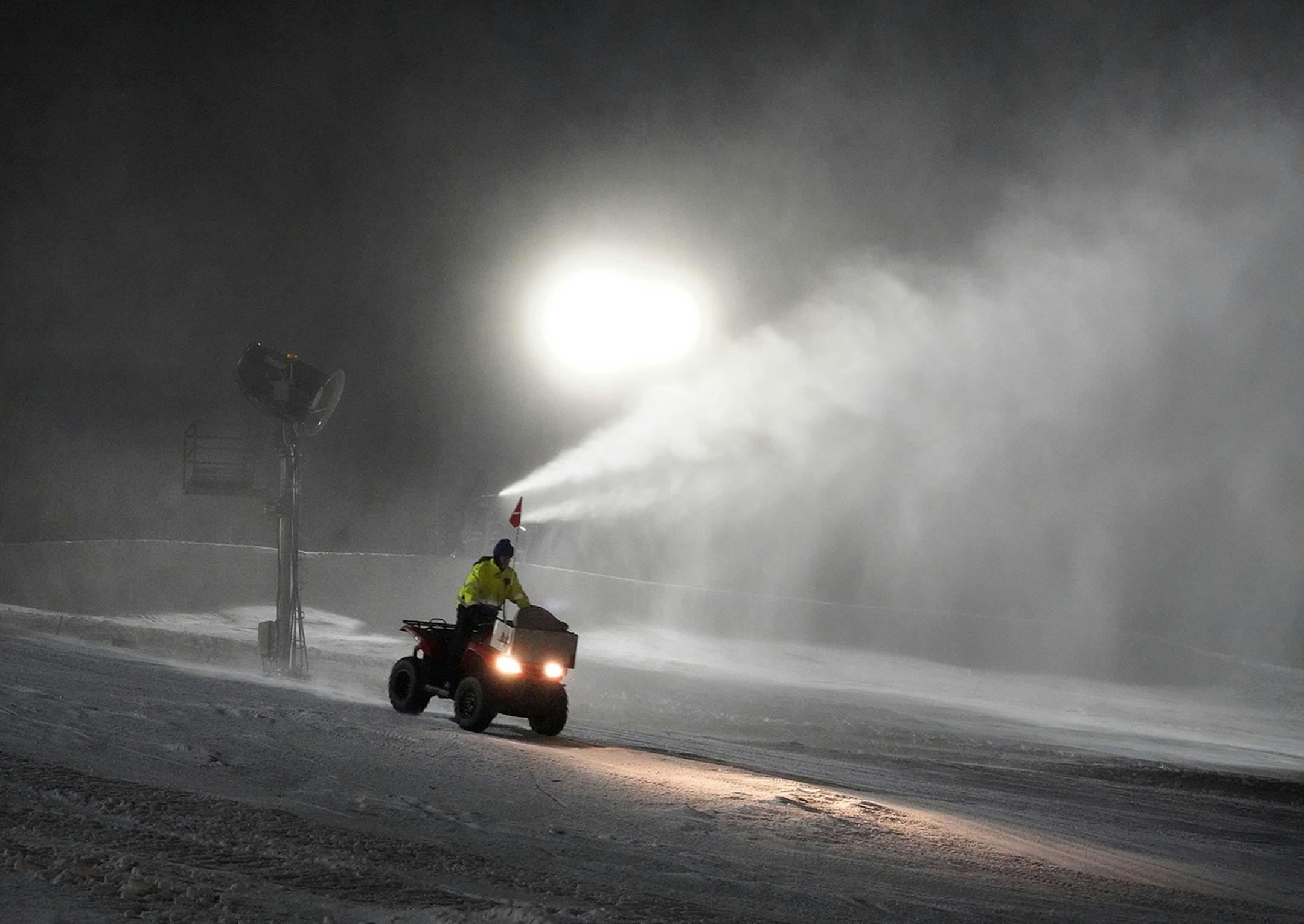 After the last skier had left the hill for the night, the crew at Hyland Hills Ski area in Bloomington got busy making more snow throughout the night. Here, Frank Blatnik heads down Big Moe on a 4 wheeler. ] brian.peterson@startribune.com Bloomington, MN Tuesday, January 7, 2020