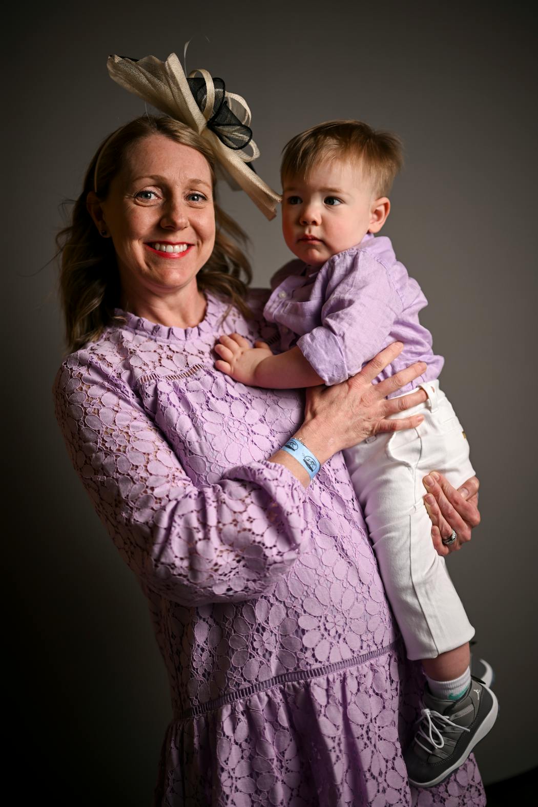Colette Klem and her husband Josh Klem usually host a derby party of their own, but they took a year off this year. Colette coordinated with son, Cade, 18 months, in a pastel purple. “We’re Vikings fans, too,” Josh added. 