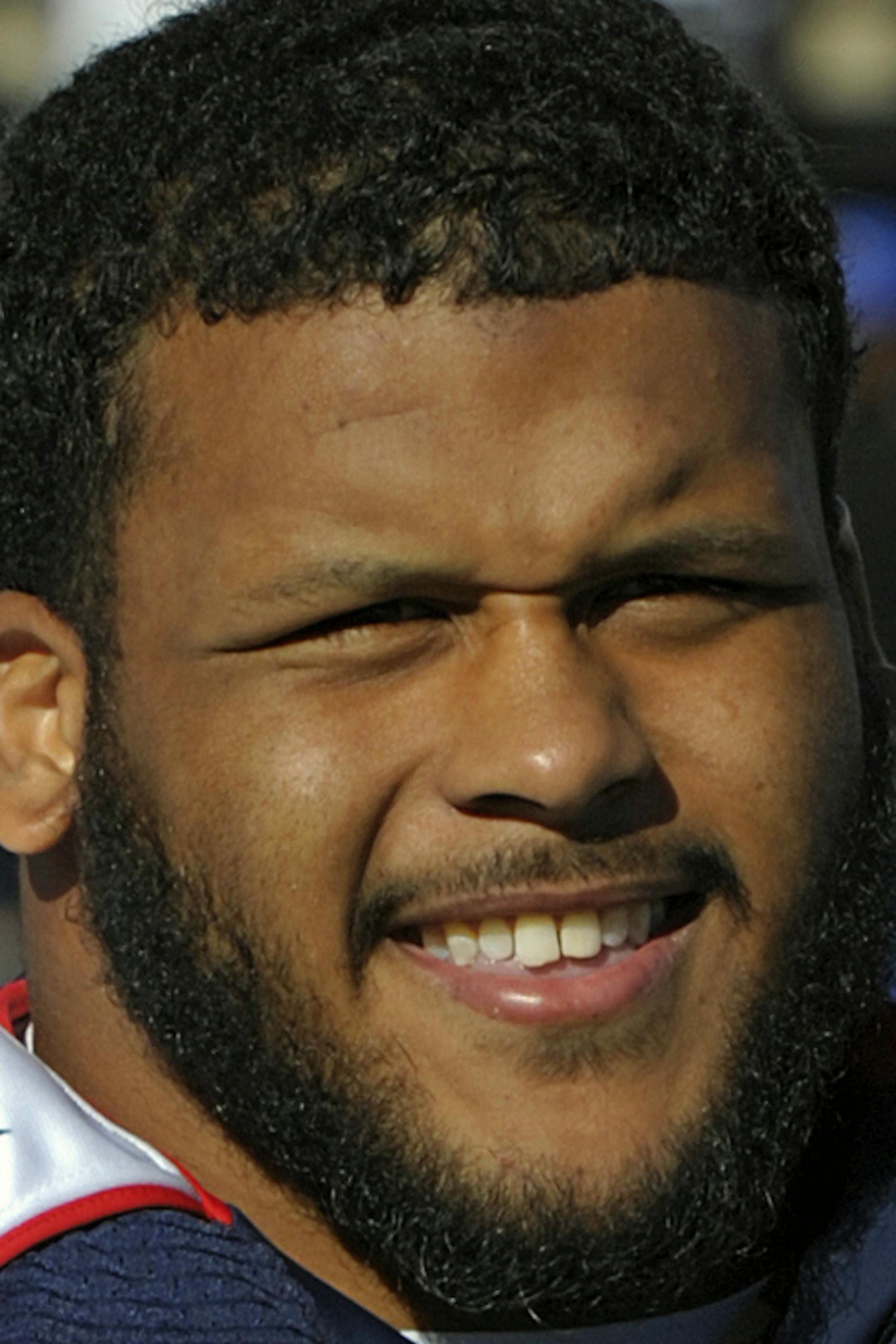 North defensive tackle Aaron Donald (97) of Pittsburgh runs on to the field before the Senior Bowl NCAA college football game on Saturday, Jan. 25, 2014, in Mobile, Ala. (AP Photo/G.M. Andrews) ORG XMIT: NYOTK