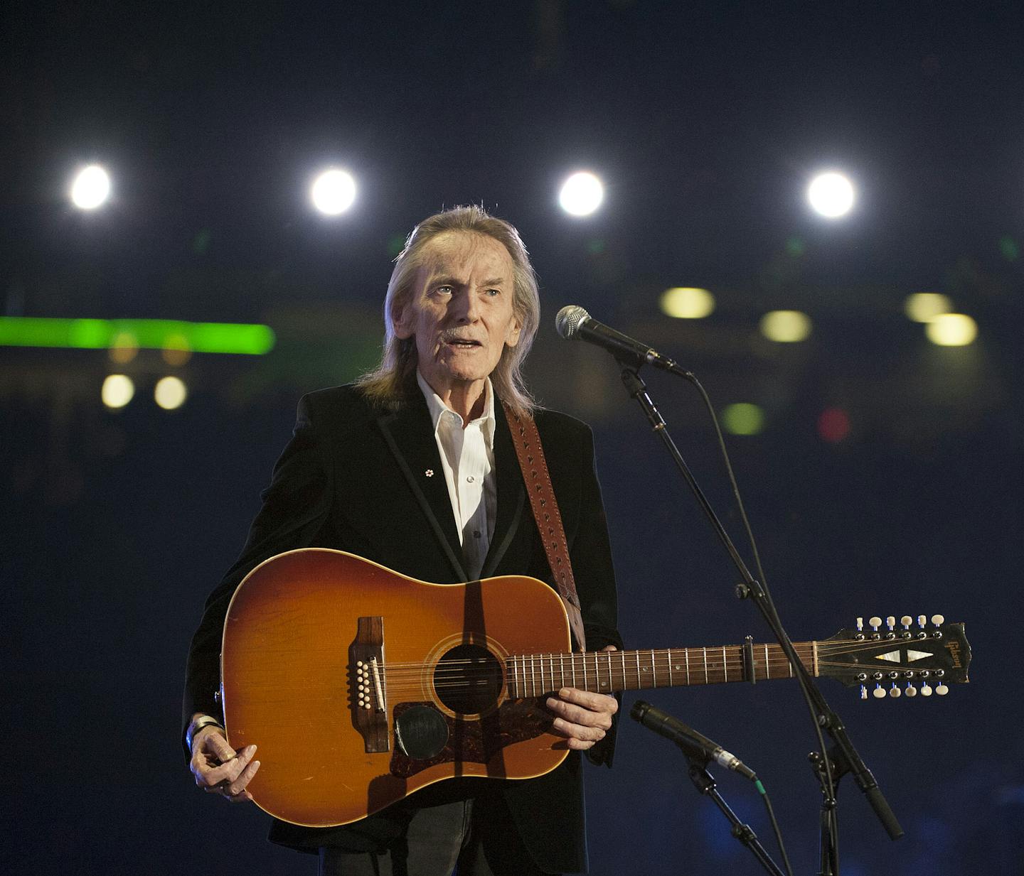 Singer Gordon Lightfoot performs during the CFL's 100th Grey Cup Championship Halftime Show at the Rogers Centre on Sunday, Nov. 25, 2012, in Toronto. (Photo by Arthur Mola/Invision/AP) ORG XMIT: INVW